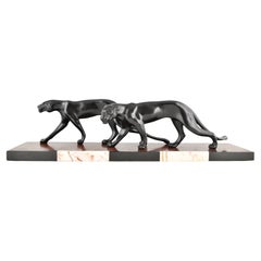 Vintage Art Deco sculpture of two panthers signed by M. Font, France 1930.