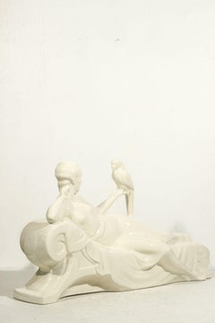 Art-déco sculpture of woman and parrot in earthenware by Sarreguemines 1930s