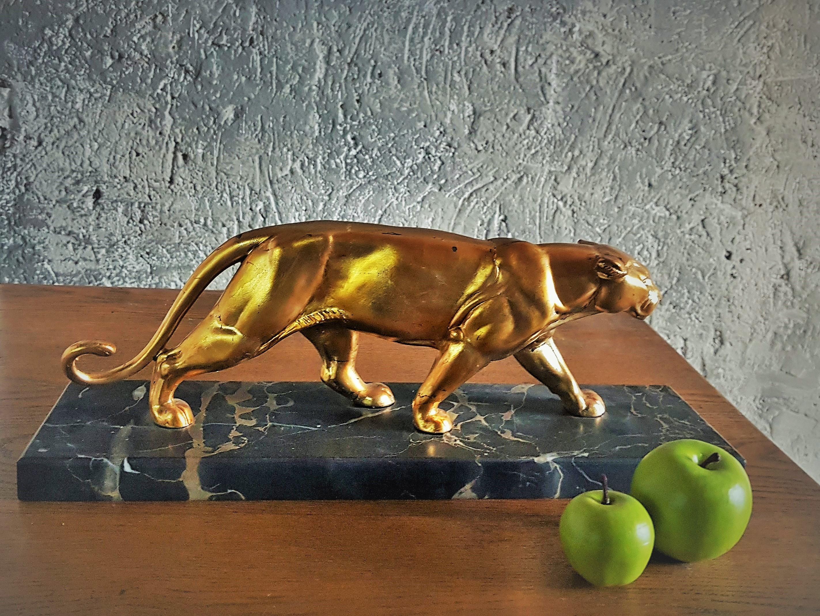 Art Deco Sculpture Panther
Portoro Marble Base
Gold leaf surface on zinc die cast
France, 1935
