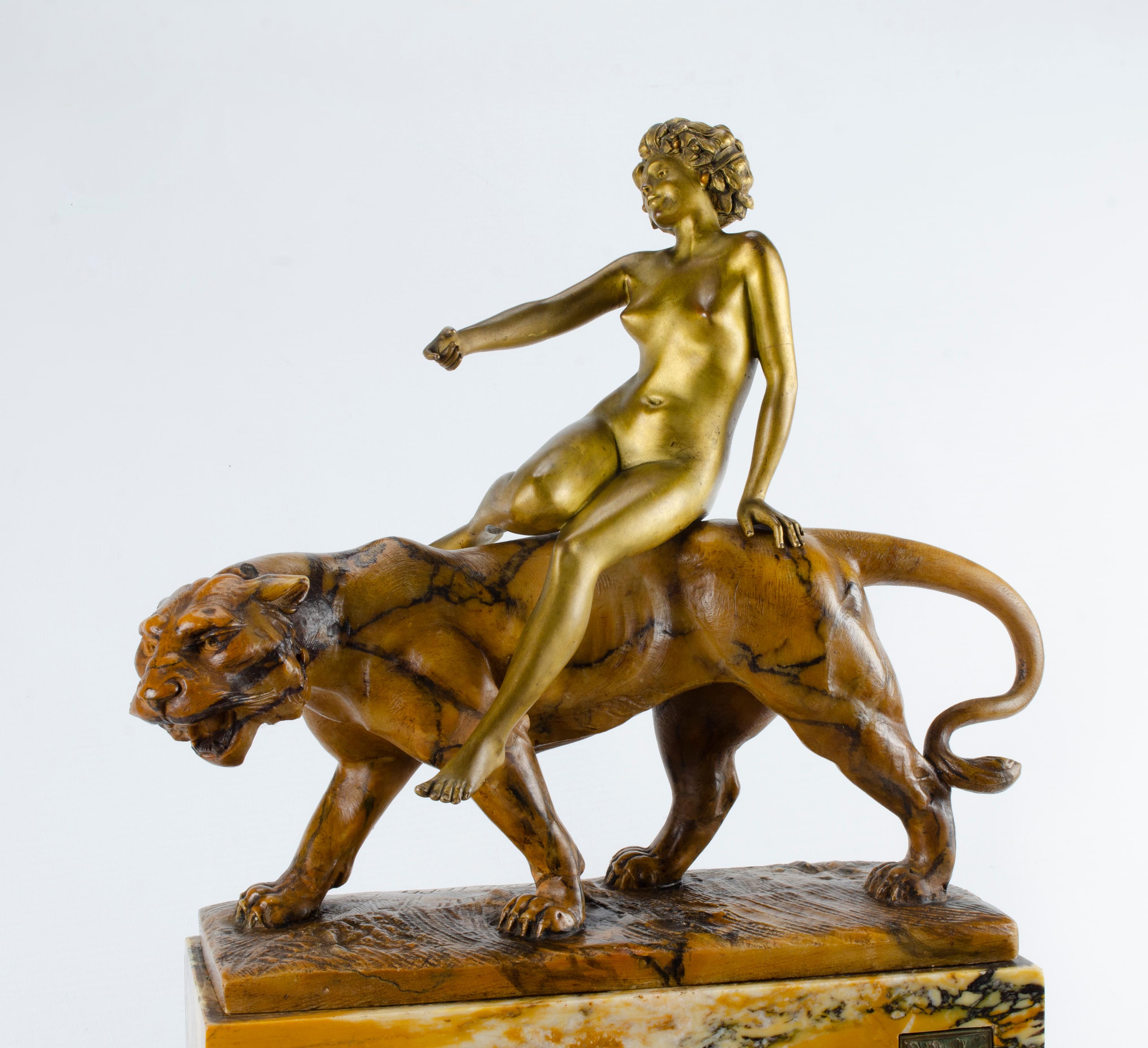 Art Deco sculpture Paul Philippe
Origin France Signed on its base
Materials Marble and bronze
Lioness and naked woman
original patina, very good condition
wear and tear.