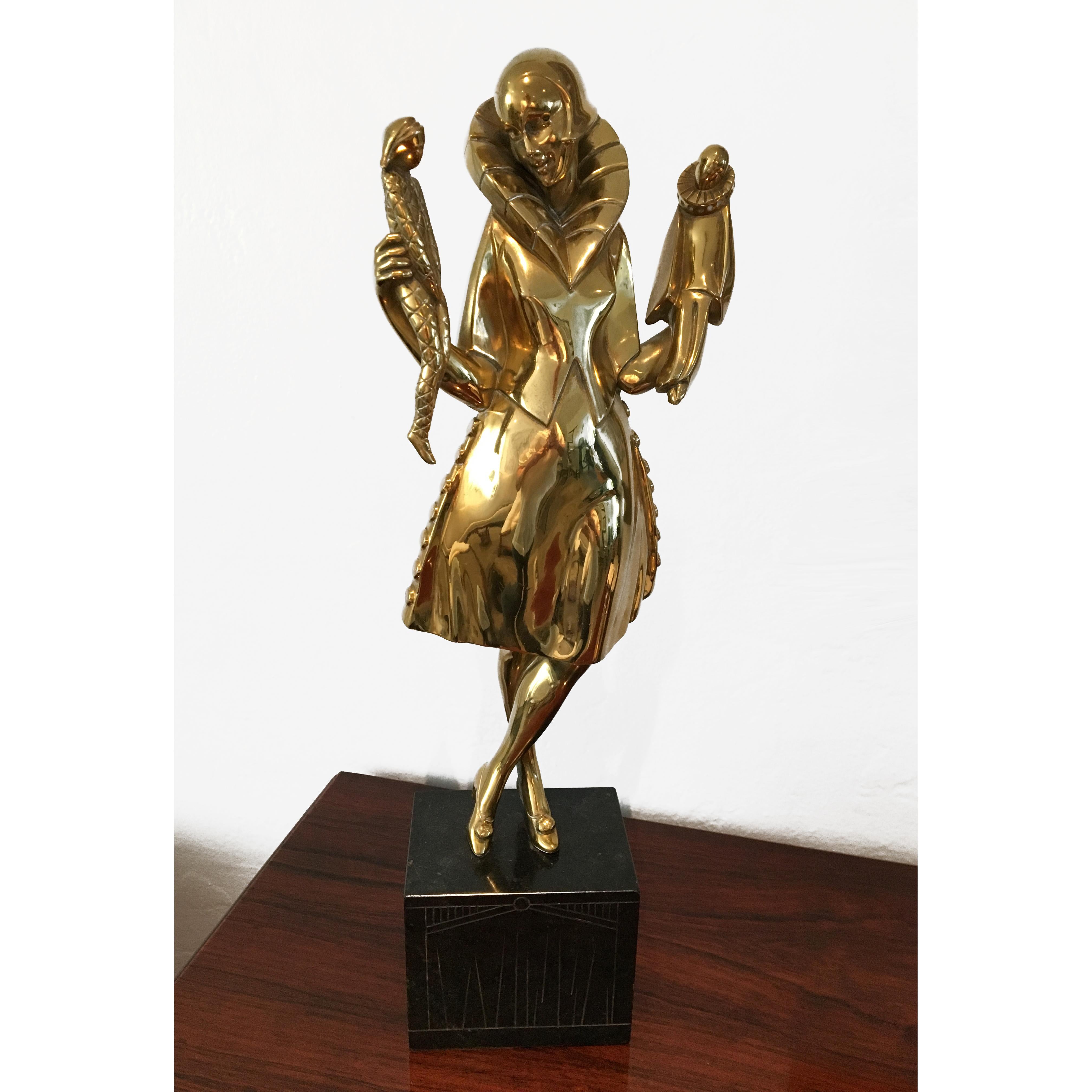 Art Deco gilded bronze sculpture on a black marble base by Pierre Le Faguays, depicting a girl with puppets 