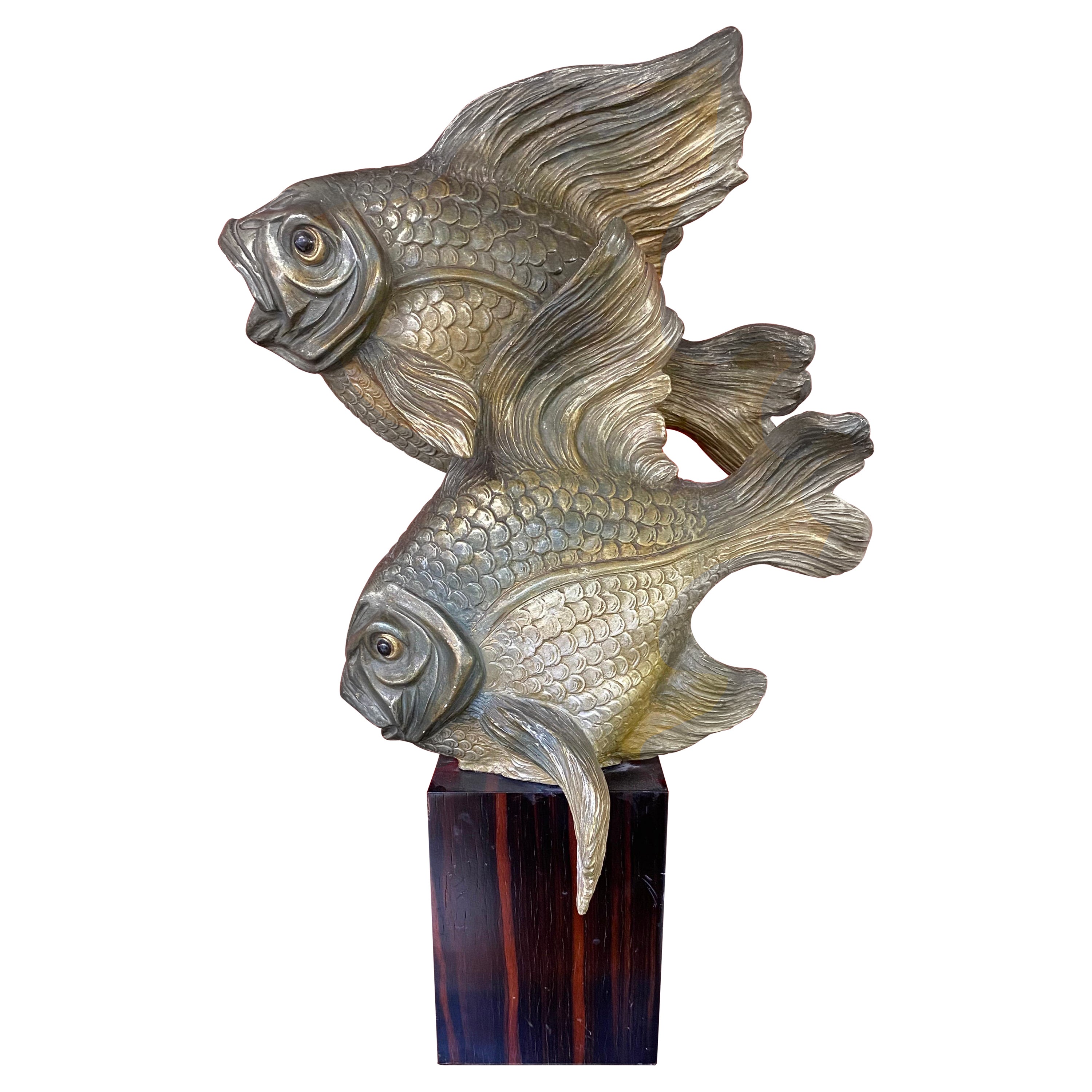 Sculpture Art Déco, représentant 2 poissons en terre cuite sur une base en macassar circa 1930