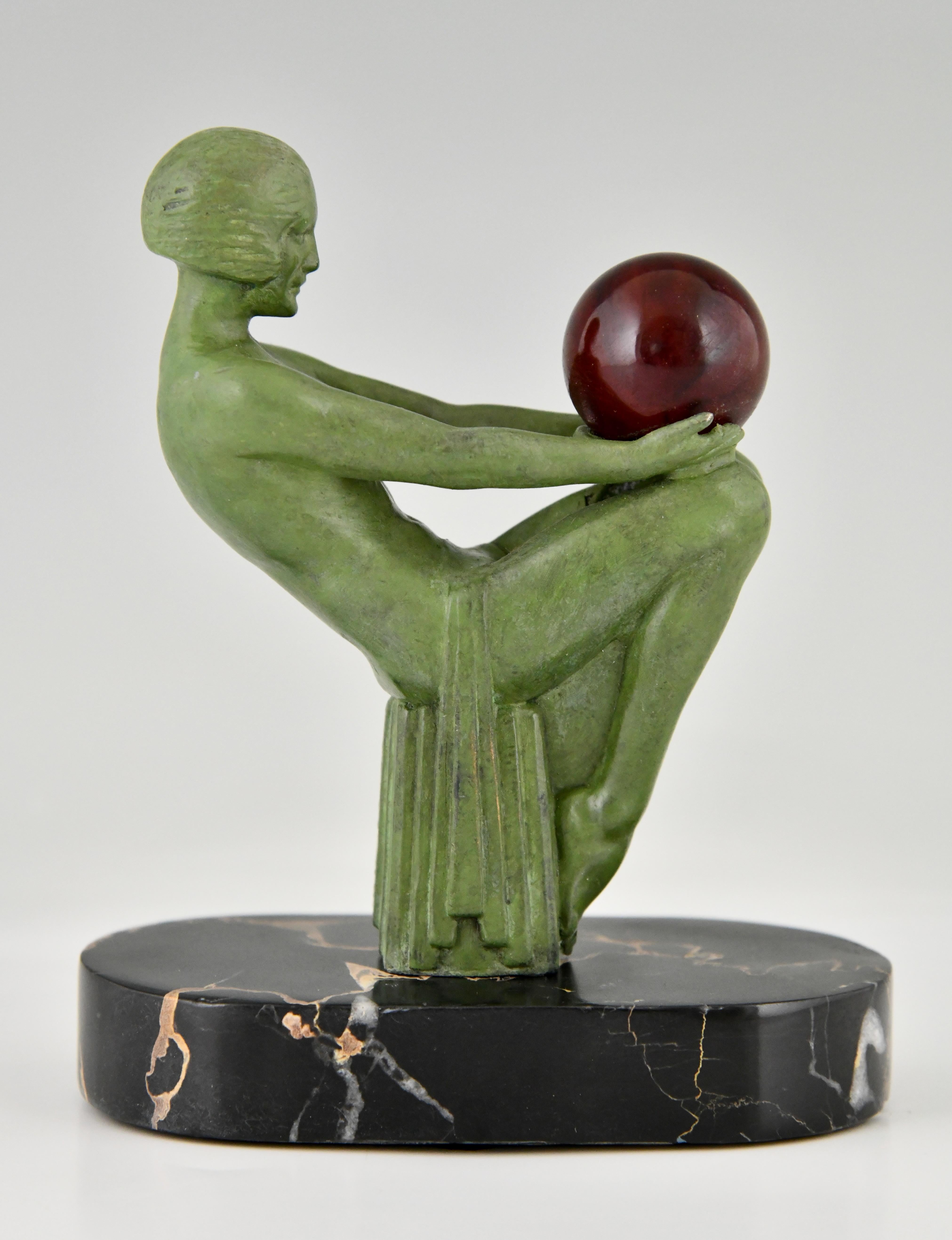 Metal Art Deco sculpture seated nude with ball signed by Max Le Verrier France 1930
