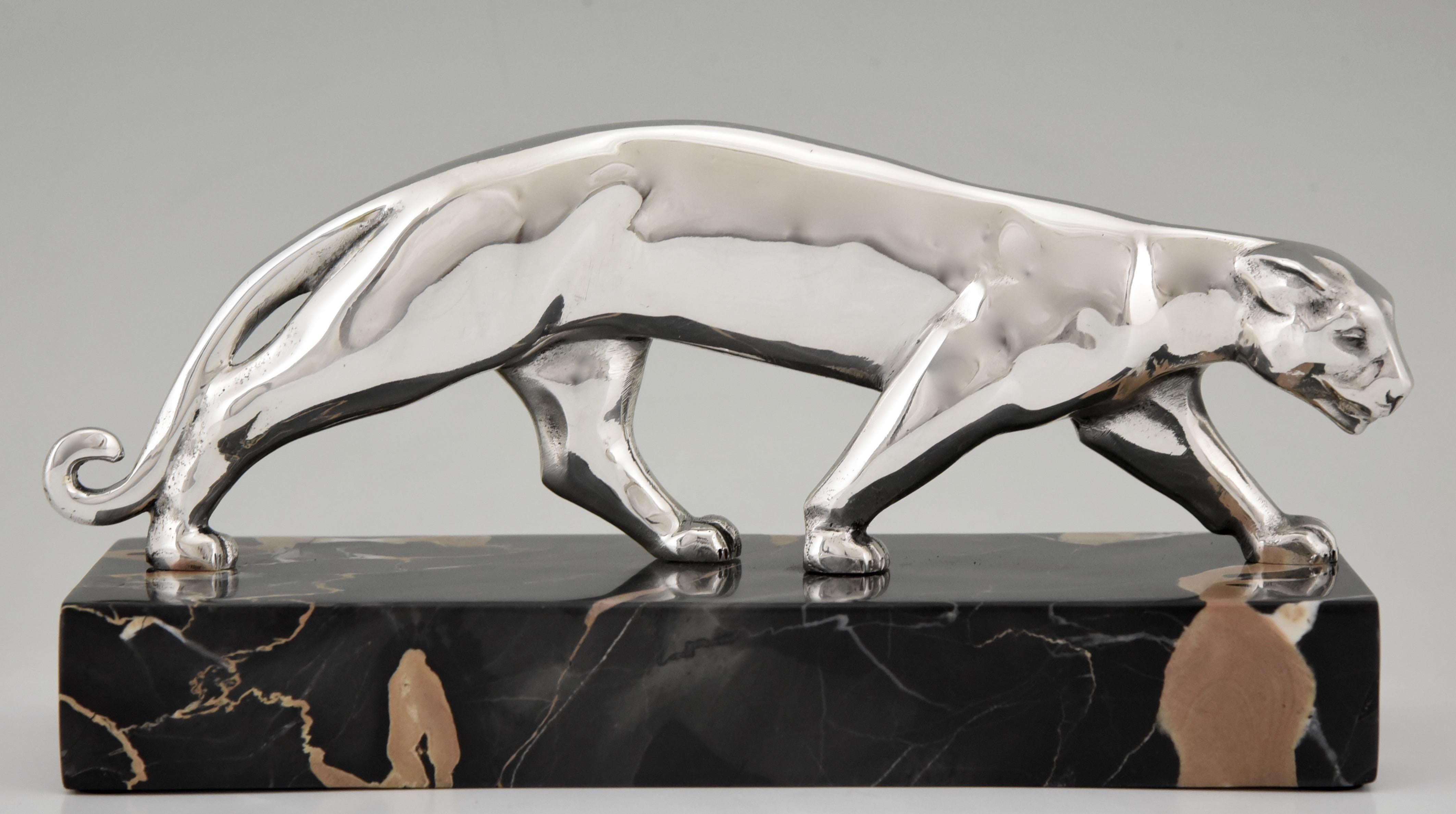 Lovely Art Deco silvered bronze panther sculpture signed by the French sculptor Luc. The sculpture is mounted on a Portor marble base, circa 1930.