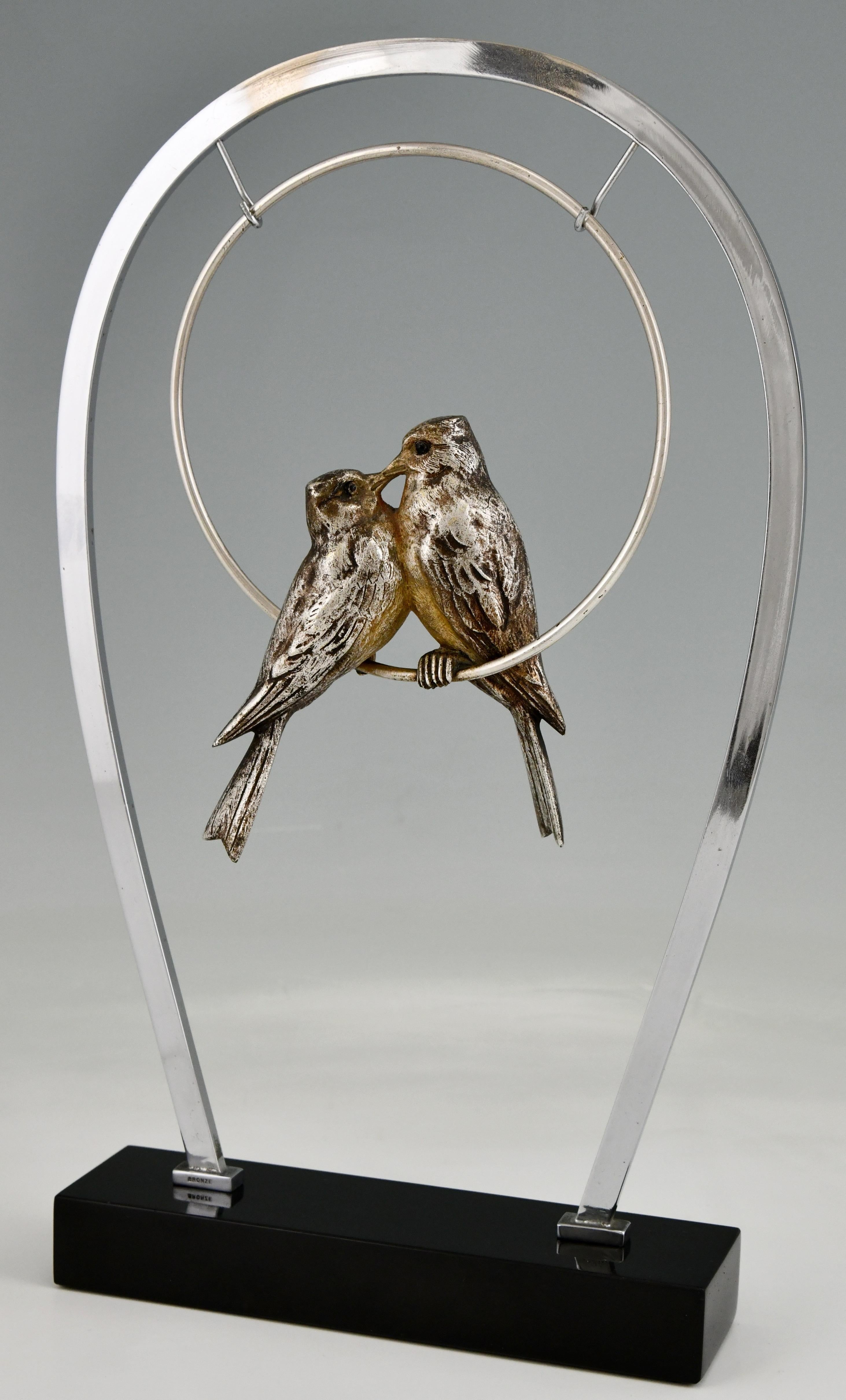 Art Deco sculpture in silvered bronze of two birds on a swing on a Belgian Black marble base. Signed by De Roche, France 1930.