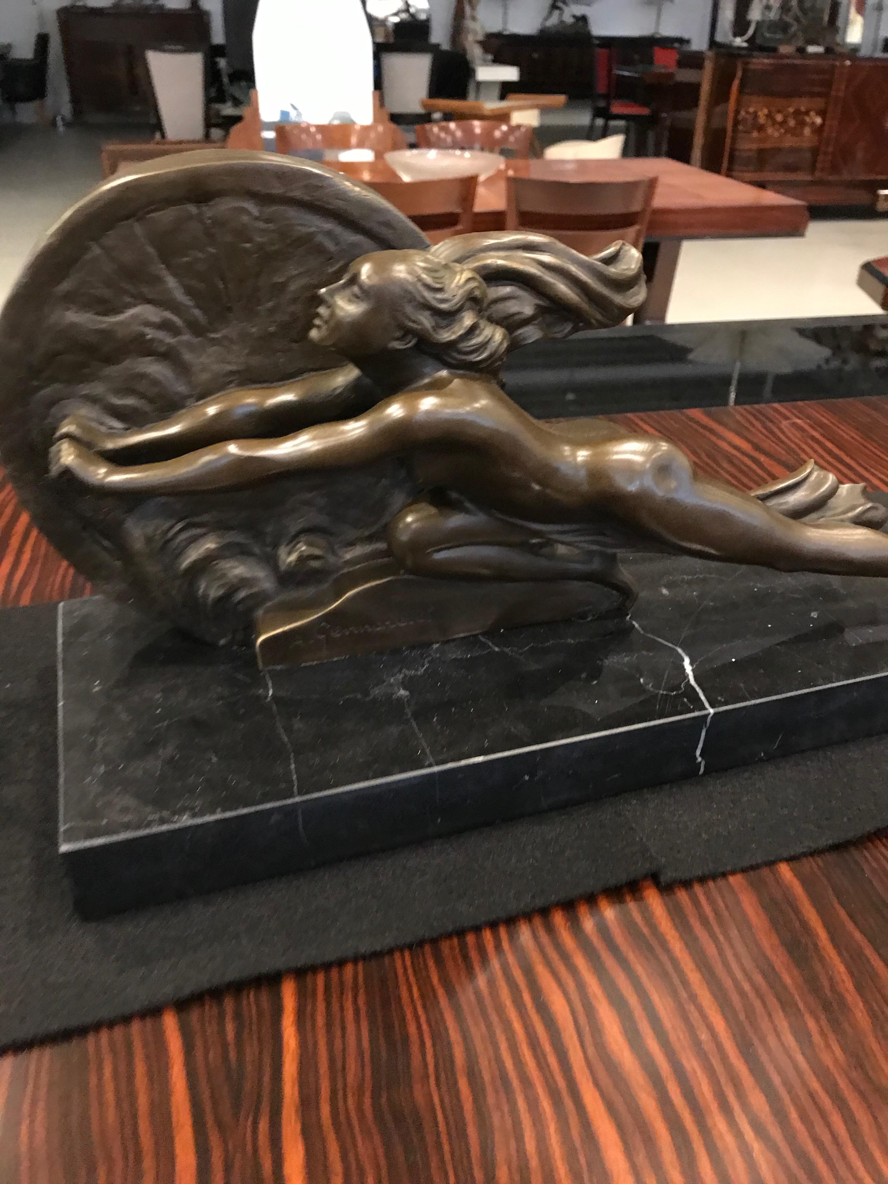Towards destiny is an Art Deco sculpture on marble base and signed by Amadeo Gennarelli.