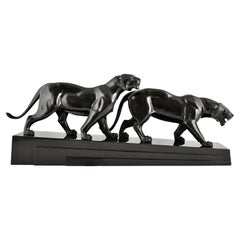 Vintage Art Deco sculpture two panthers signed by Irene Rochard. 