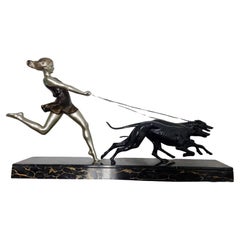 Escultura Art Decó Joven corriendo con galgos de Geo Maxim