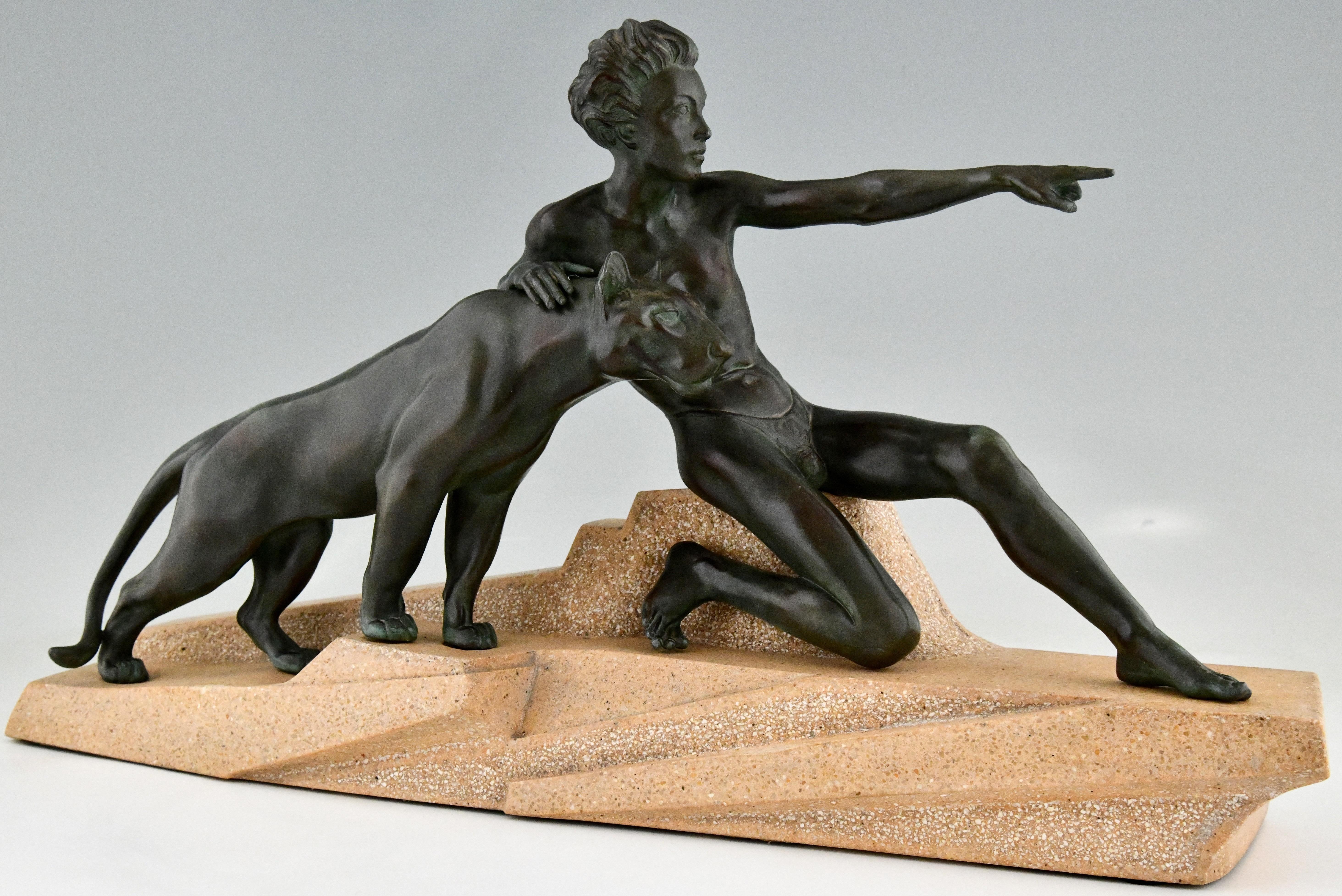 Art Deco sculpture young man with panther by Max Le Verrier. 
The sculpture is executed in patinated Art metal and stands on a carved stone base. 
France 1930. 
Literature:
Art Deco sculpture by Alistair Duncan.
Statuettes of the Art Deco