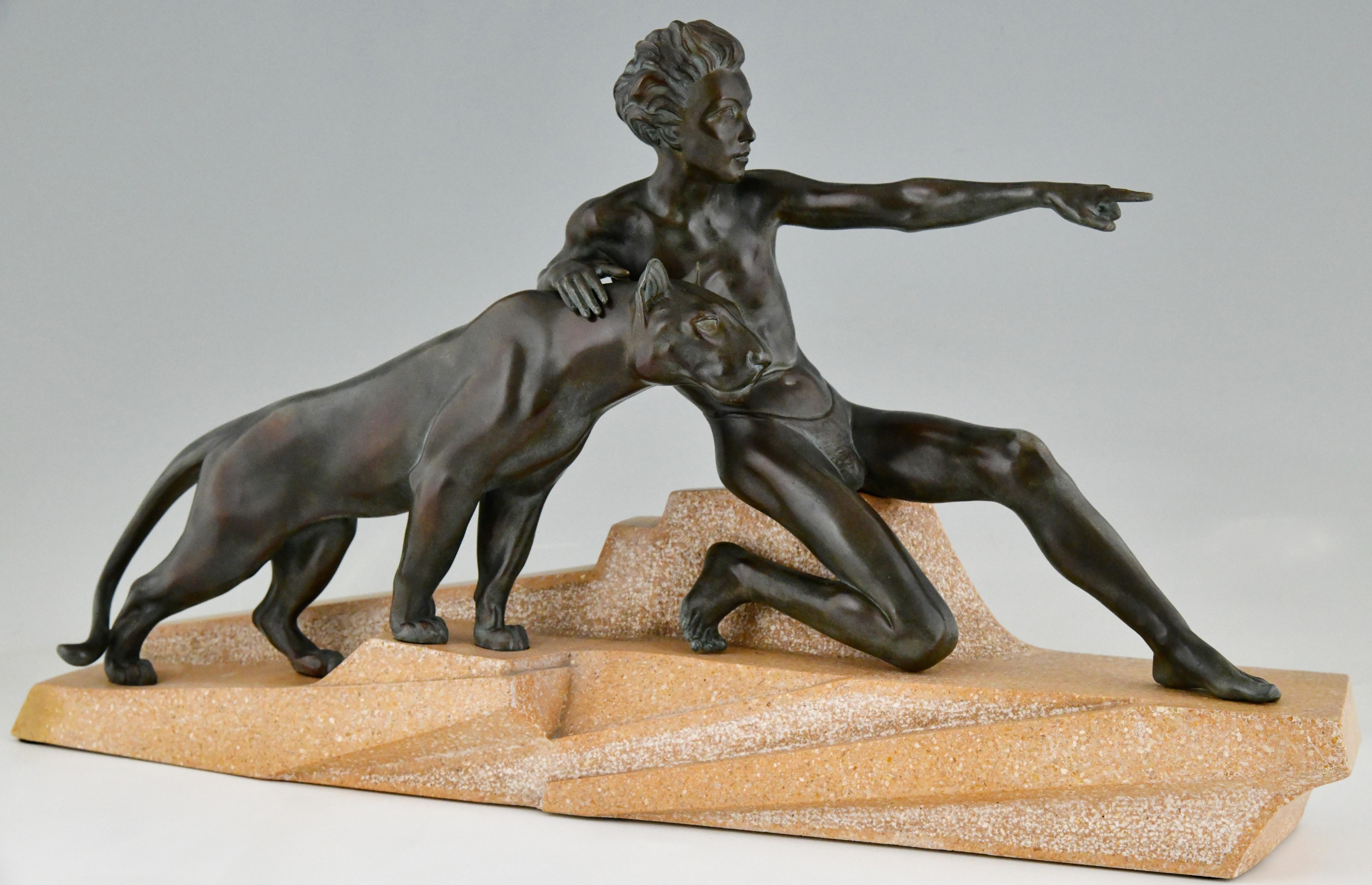 Art Deco sculpture young man with panther by Max Le Verrier. 
The sculpture is executed in patinated Art metal and stands on a carved stone base. 
France 1930. 
Literature:
Art Deco sculpture by Alistair Duncan.
Statuettes of the Art Deco period