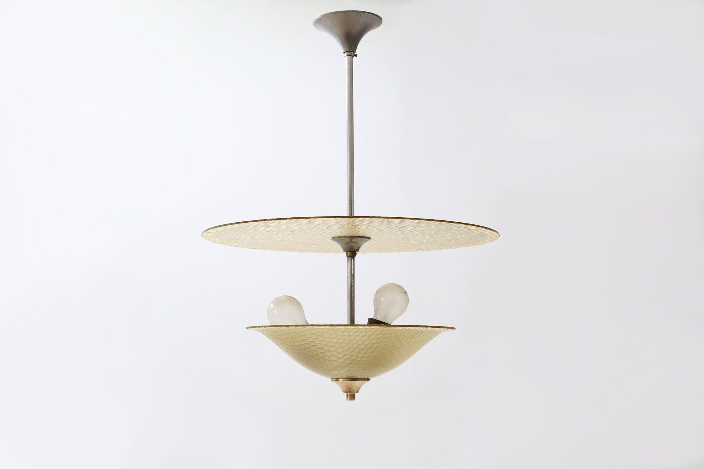 France / 1930 / pendant lamp / glass, chromed metal / Vintage / Art Deco / Mid-Century

Large elegant French Art Deco pendant made off sculpture glass and chromed metal.

This exquisite piece is designed to be the centerpiece of any room,