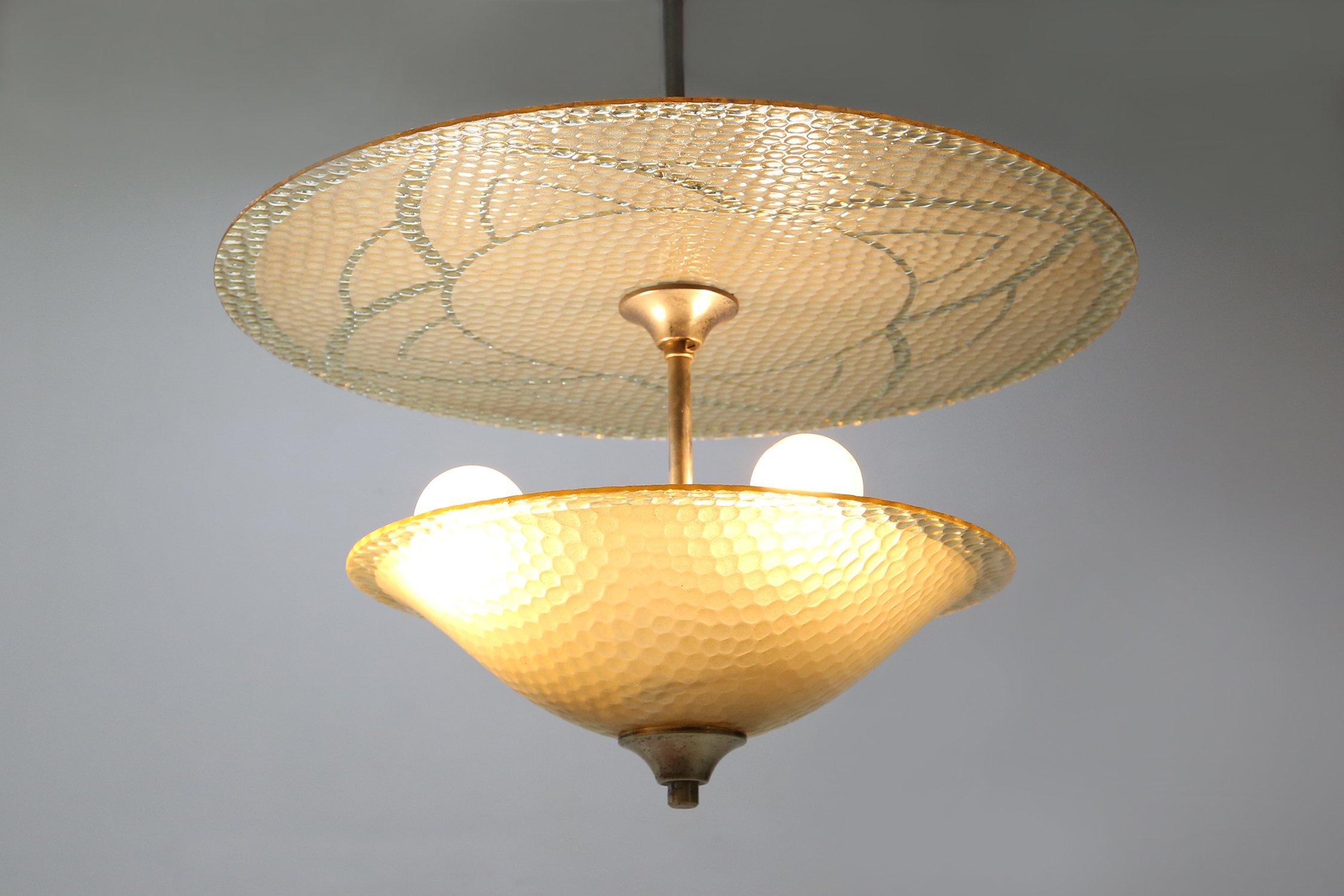 Metal Art Deco sculptured glass pendant lamp, France 1930s For Sale