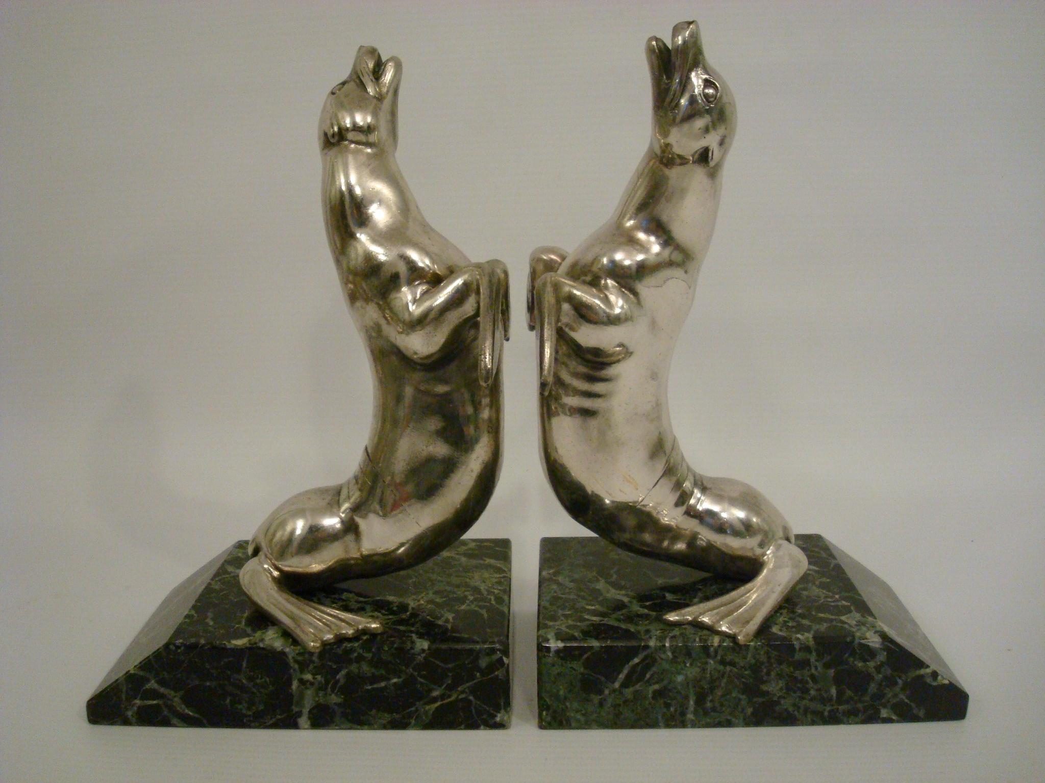 Nice pair of Art Deco seal bookends designed by the French artist Louis Albert Carvin, silvered white metal on a green marble base, France, 1930.

“Animals in bronze” by Christopher Payne. Antique collectors club.?