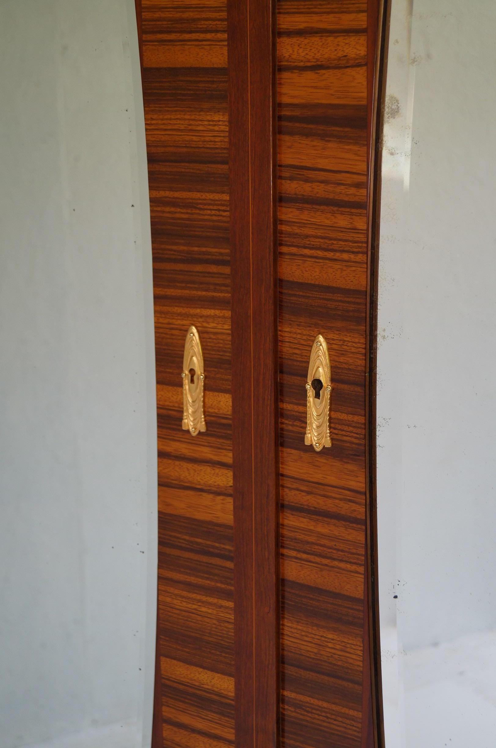 Art Deco Secesja wardrobe we are pleased to present the Polish Secession of 1900s-1910s. The wardrobe was made in Krakow, Poland, it comes from the Krakow Center, it was made of elmwood. The wardrobe was renovated, it was cleaned to bare veneer, and