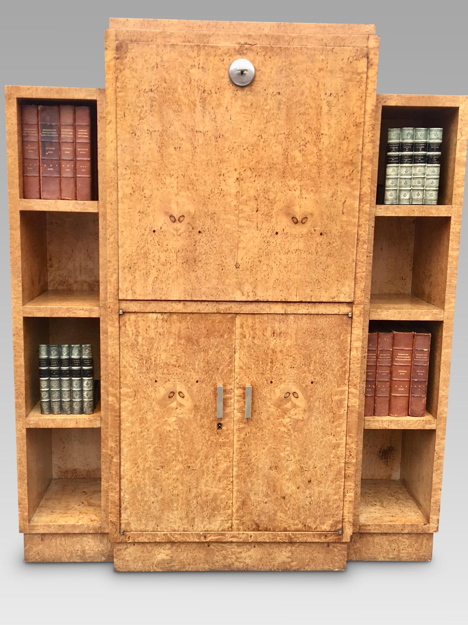 This fine quality secretaire bookcase is French and dates from the 1930s. Veneered in Burr Maple and made with an exceptional quality of craftsmanship, it fits perfectly into todays' desire for lighter and more decorative pieces of furniture.

The