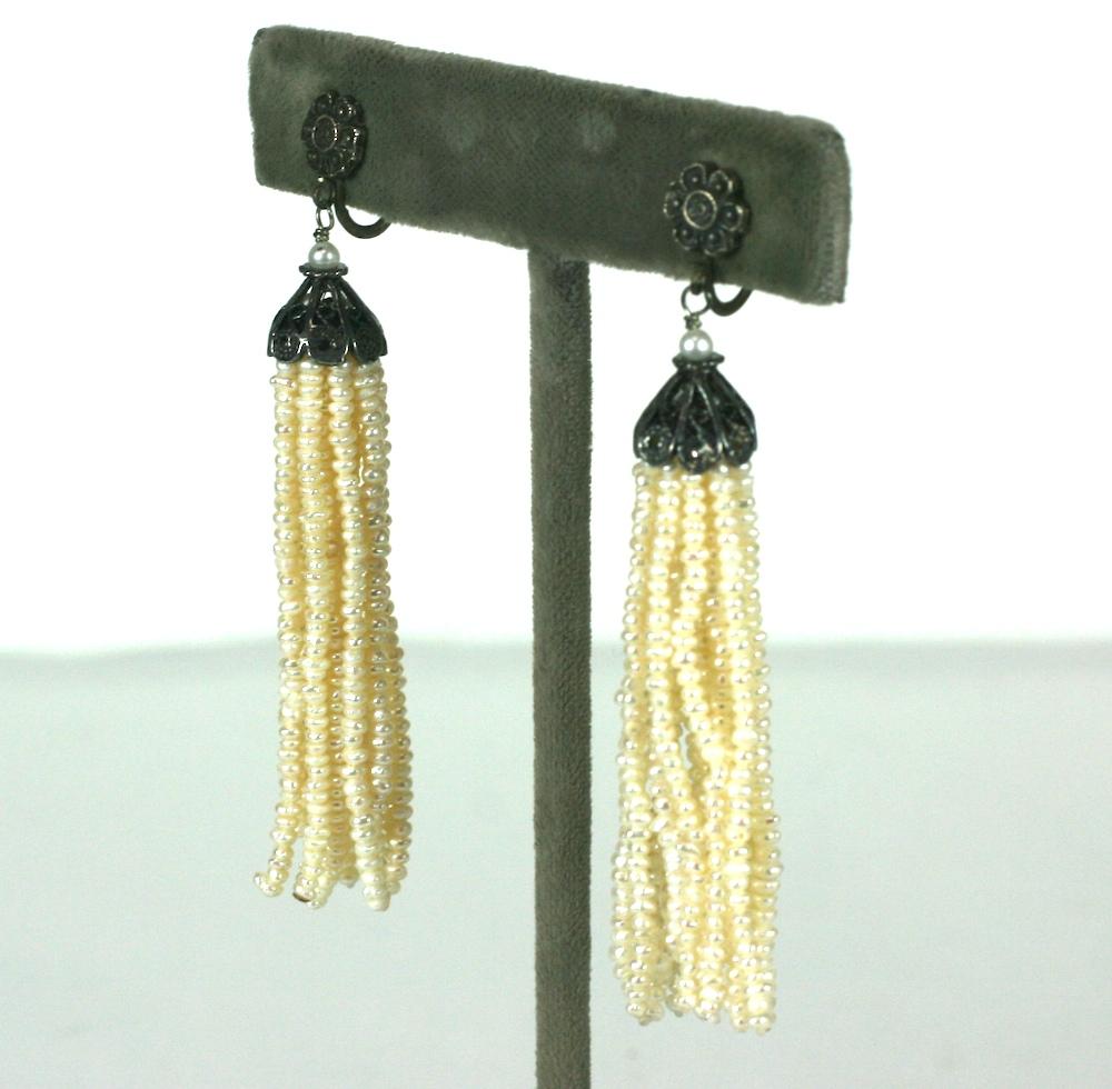 Art Deco Seed Pearl Tassel Sterling Earrings with floral motifs and filgree silver caps with freshwater seed pearl tassels.  
Screw back fittings.  1930's USA.   2.75