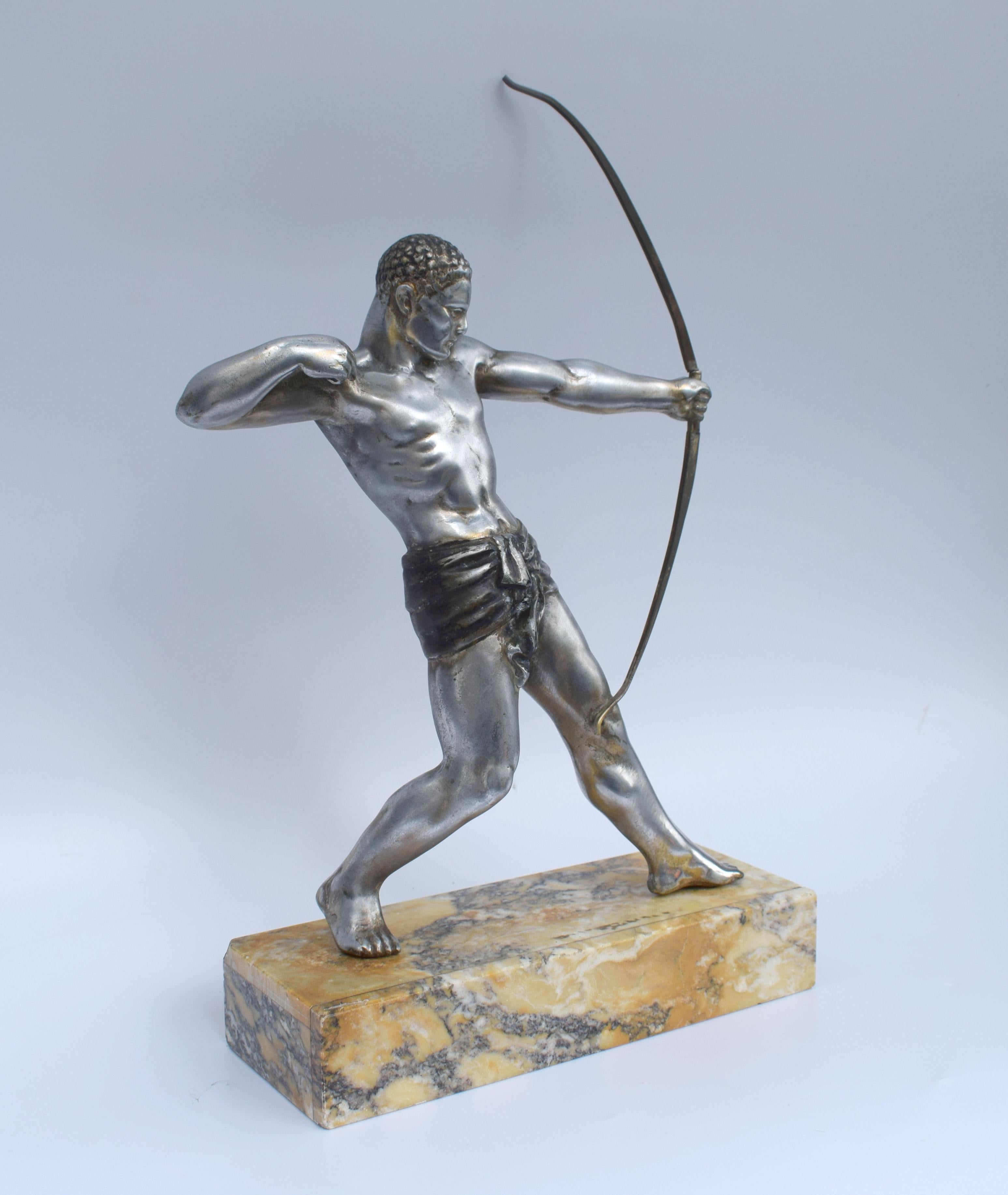 Superb 1930s Art Deco silvered spelter male semi nude figure on tri colored marble base. Not signed but sourced in France. Superb detailing and craftsmanship. Condition is very good no flaws to mention, just regular signs of age.