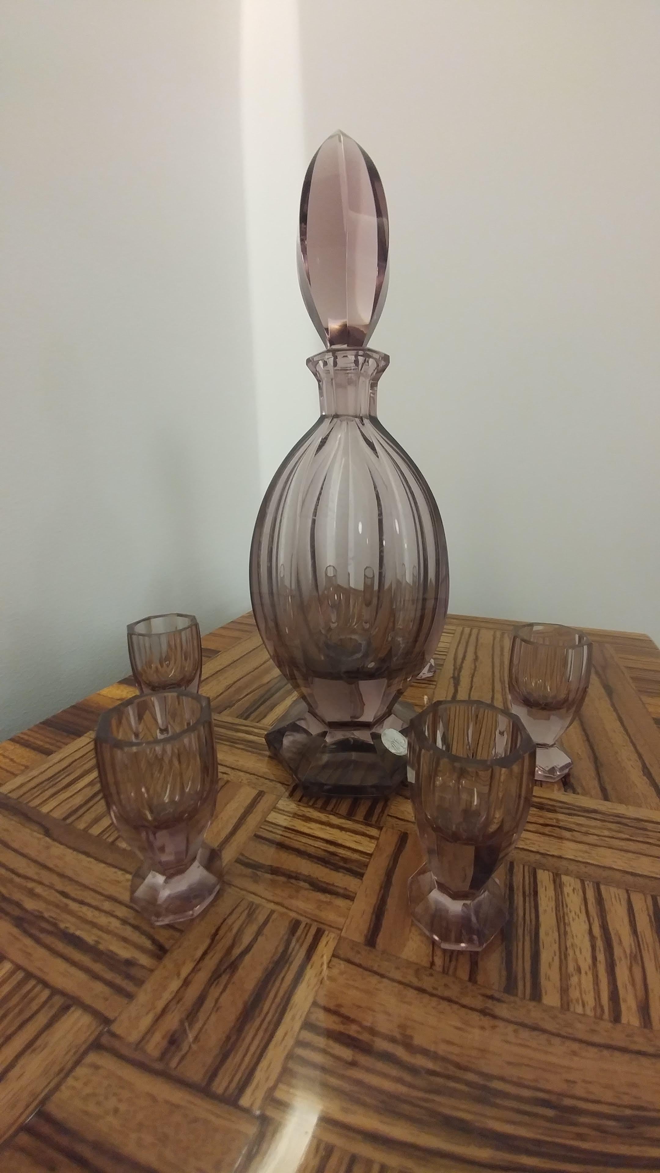 I offer you a classic Art Deco set of a decanter and 6 glasses - produced in the 1930s in Karlsbad (today's Karlove Vary in the Czech Republic) in the prestigious Ludwik Moser crystal glassworks, which supplied the royal courts of Europe and Asia