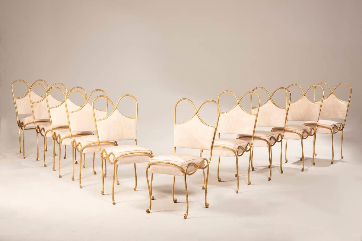 Elegant Set of 10 French Wrought Iron Chairs, 1940s
Refined set of 10 French wrought iron chairs dating back to the 1940s. The metal frames feature a graceful design with curved legs and rounded details along the edges and backrests, characteristic