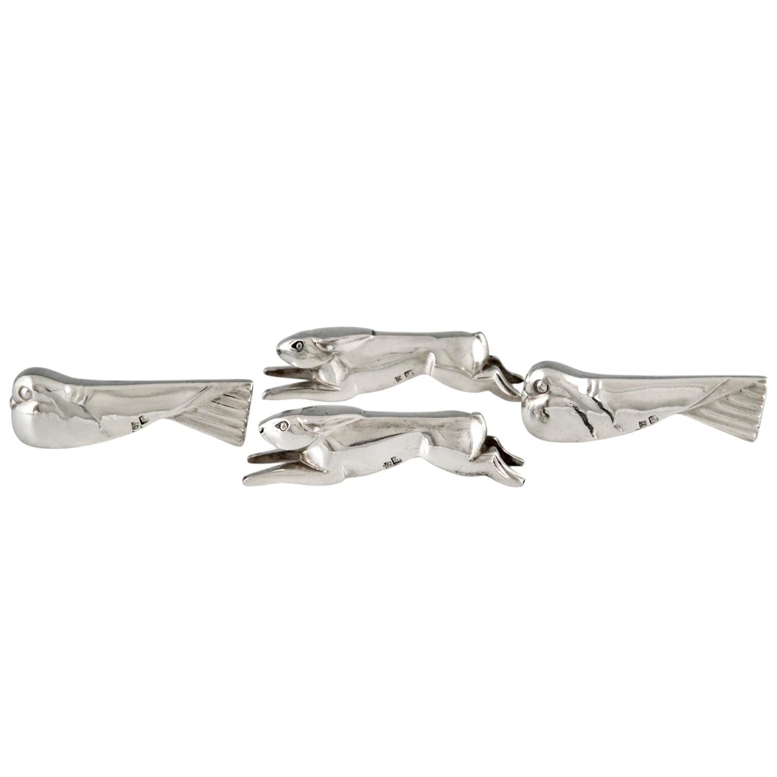 French Art Deco set of 12 animal knife-rests by Ercuis France 1930.