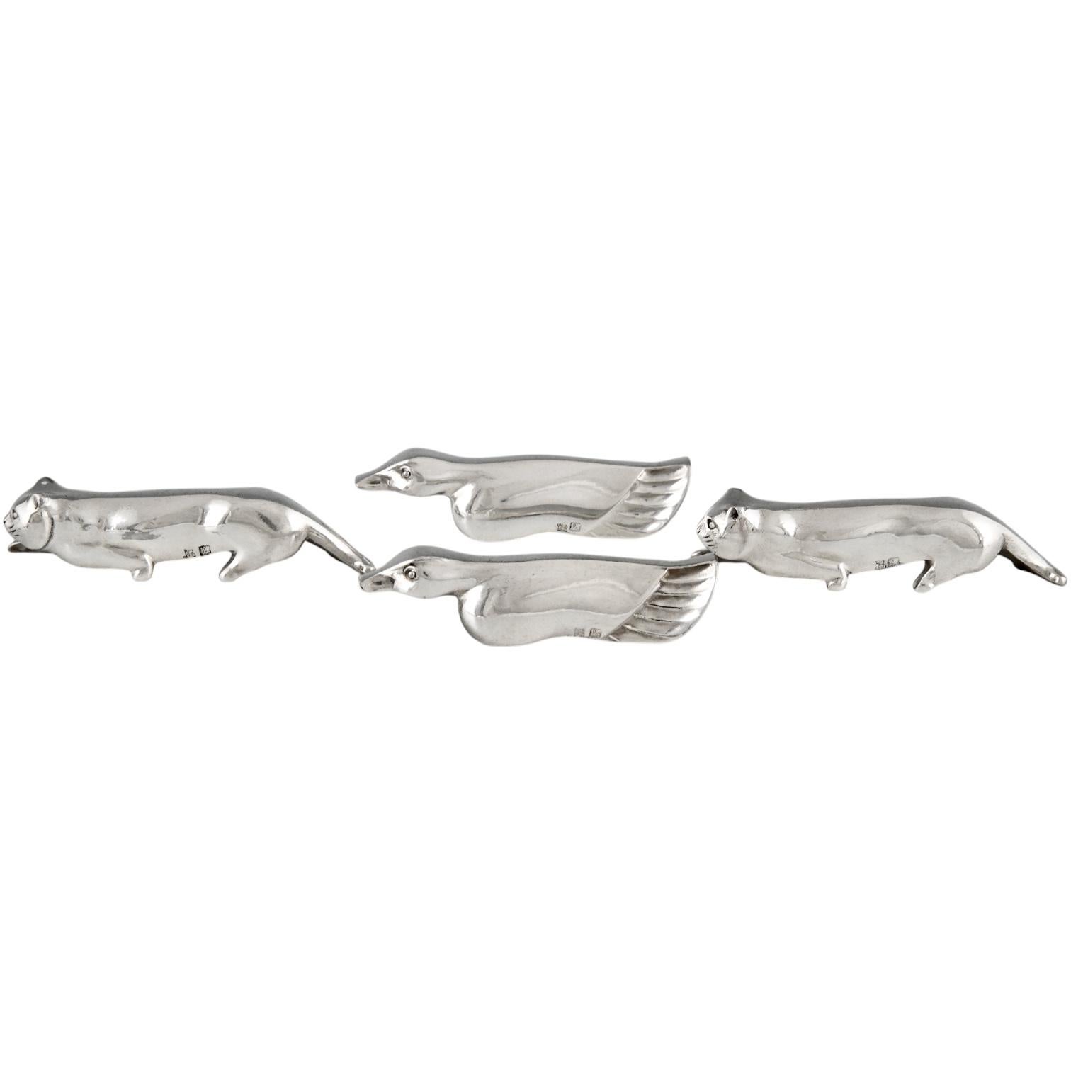 Silvered Art Deco set of 12 animal knife-rests by Ercuis France 1930.