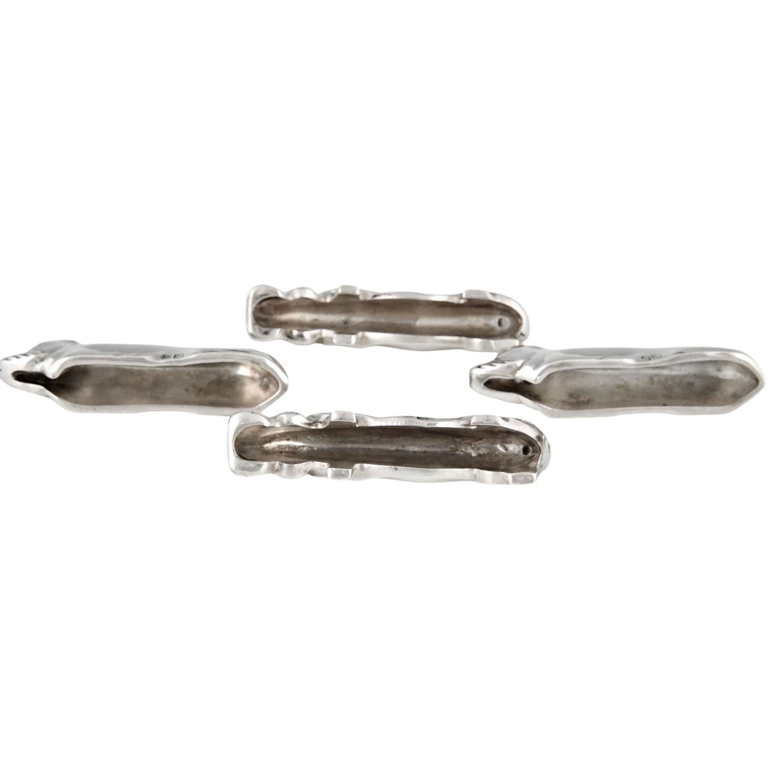 Mid-20th Century Art Deco set of 12 animal knife-rests by Ercuis France 1930.