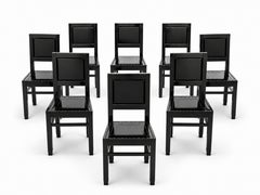 Set Art Déco di 8 sedie da pranzo in laccato nero lucido con sedute borchiate