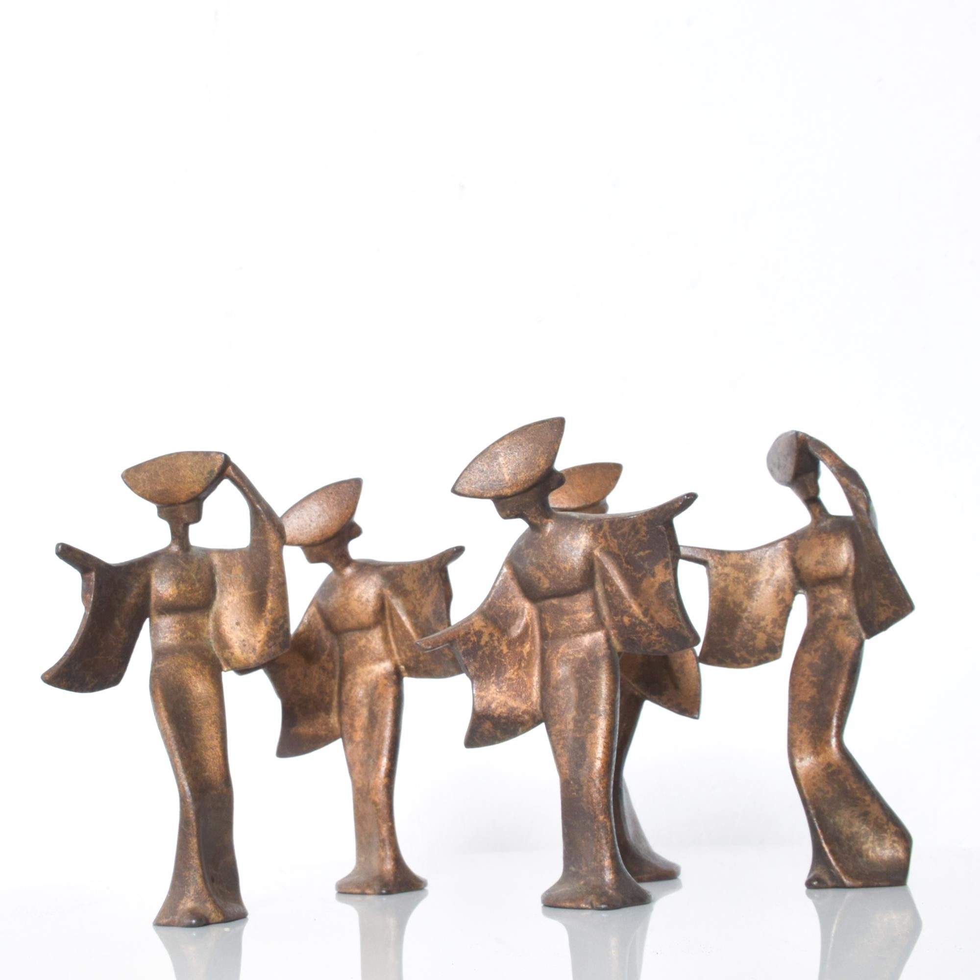 Set of four lovely Japanese Art Deco graceful geisha figurine sculptures in patinated bronzed finished iron
Made in Japan
Measures: 7