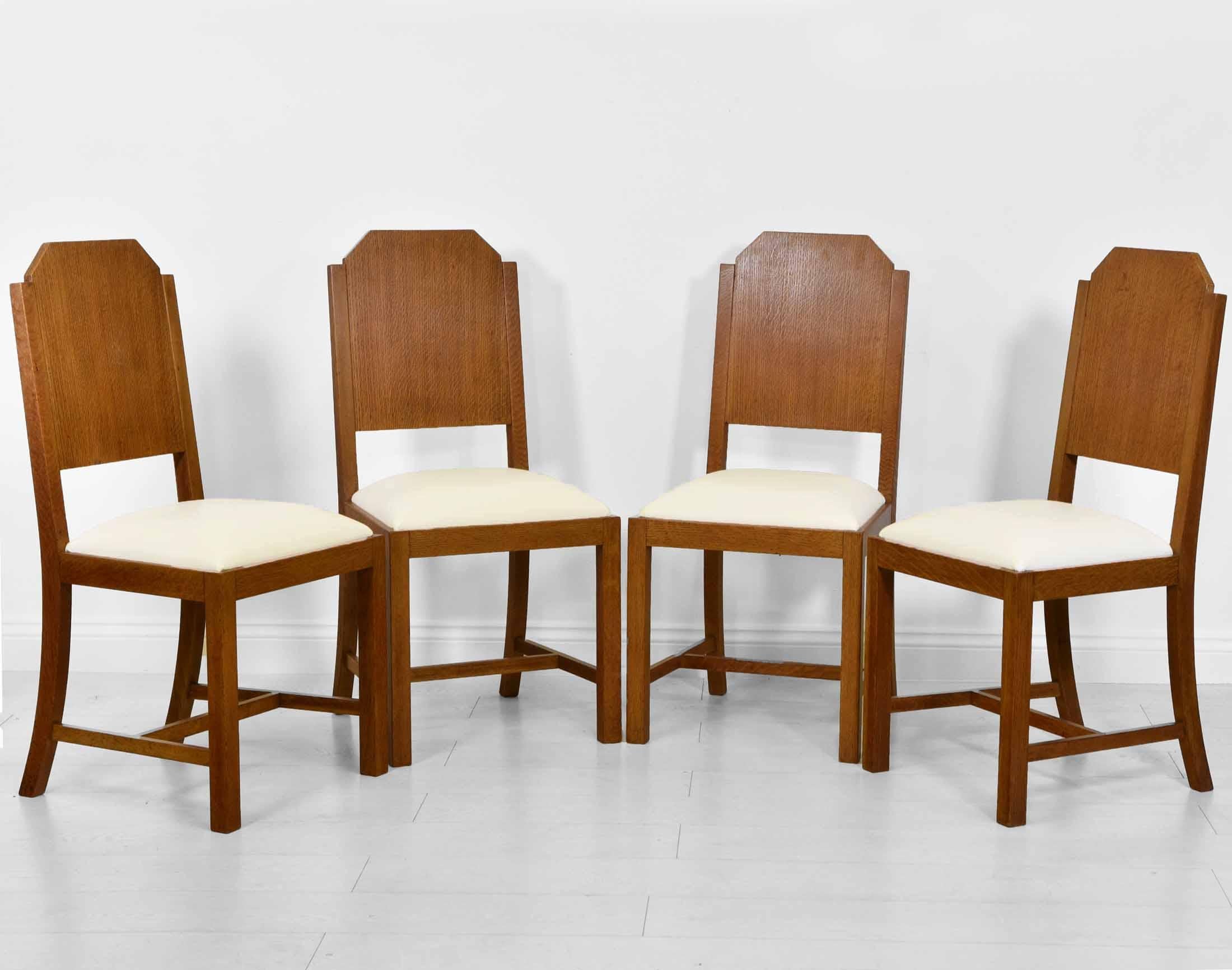 British Art Deco Set of Four Oak and Leather Dining Chairs