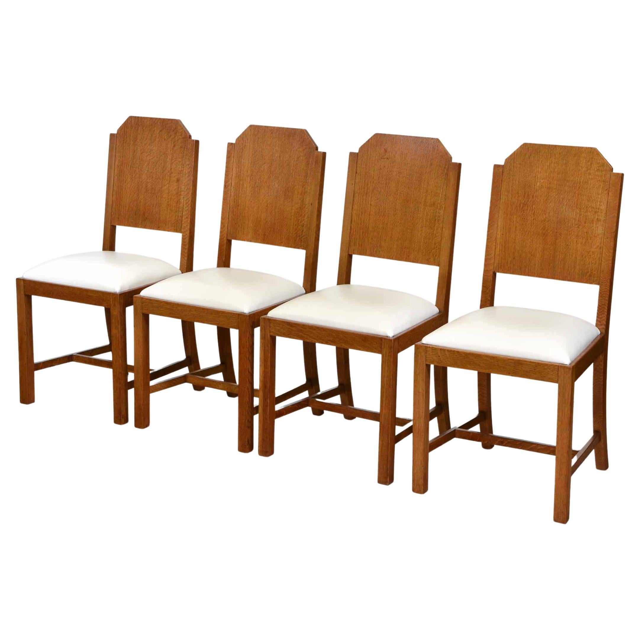 Art Deco Set of Four Oak and Leather Dining Chairs