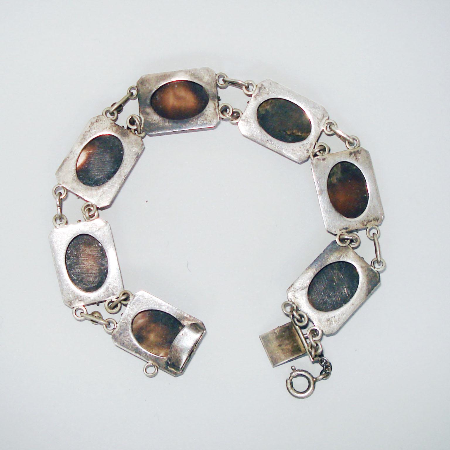 Early 20th Century Art Deco Seven Days Silver Bracelet with Chariots Motif
