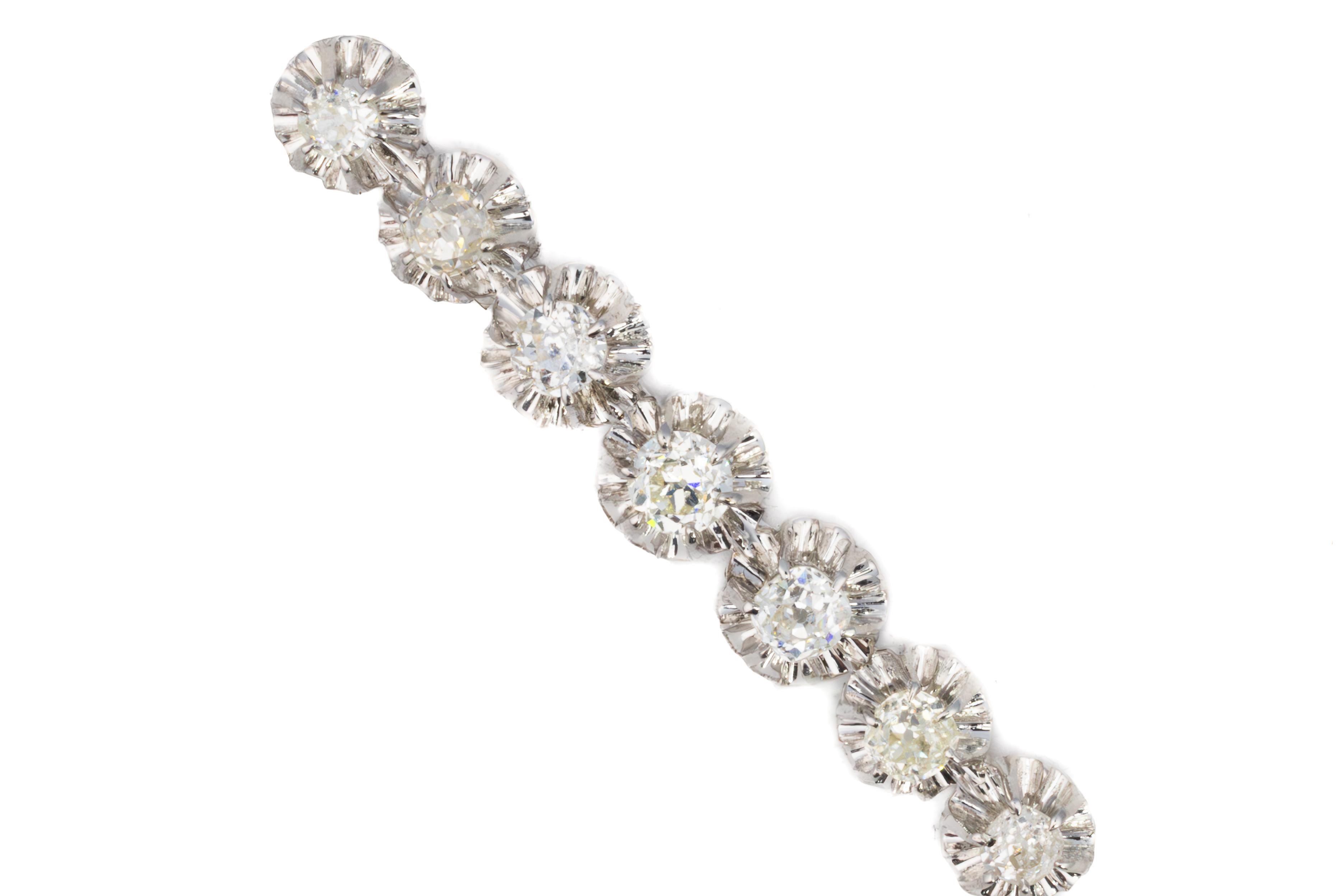 Round Cut Art Deco Seven Diamond Platinum Bar Brooch For Sale