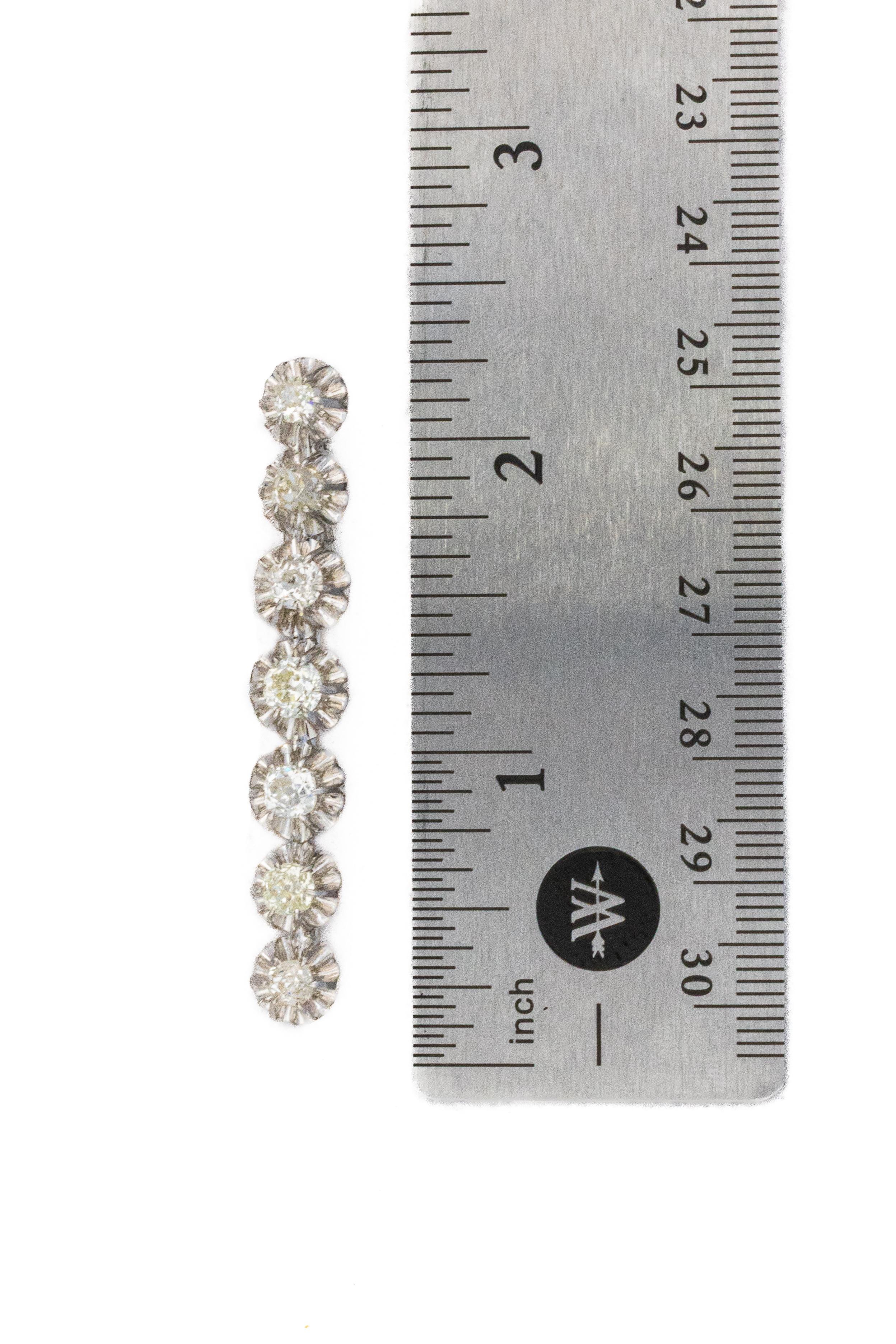 Women's Art Deco Seven Diamond Platinum Bar Brooch For Sale