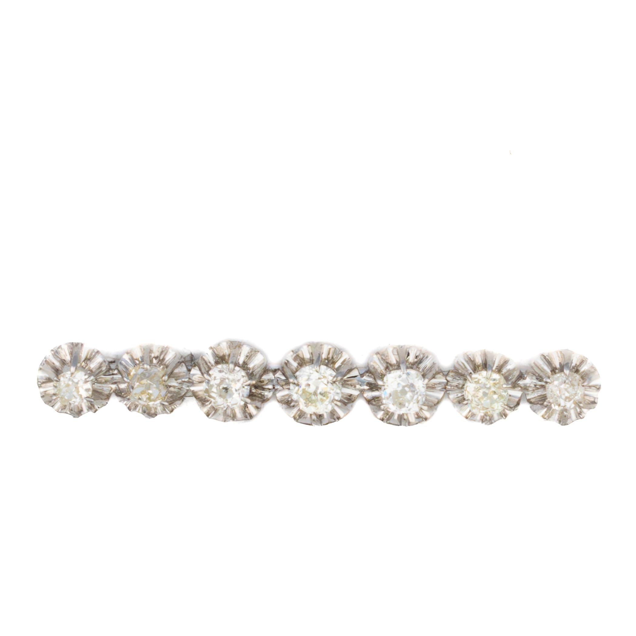 Art Deco Seven Diamond Platinum Bar Brooch For Sale
