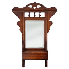 Art Deco shaving or wall cabinet in wood with mirror, France ca. 1930