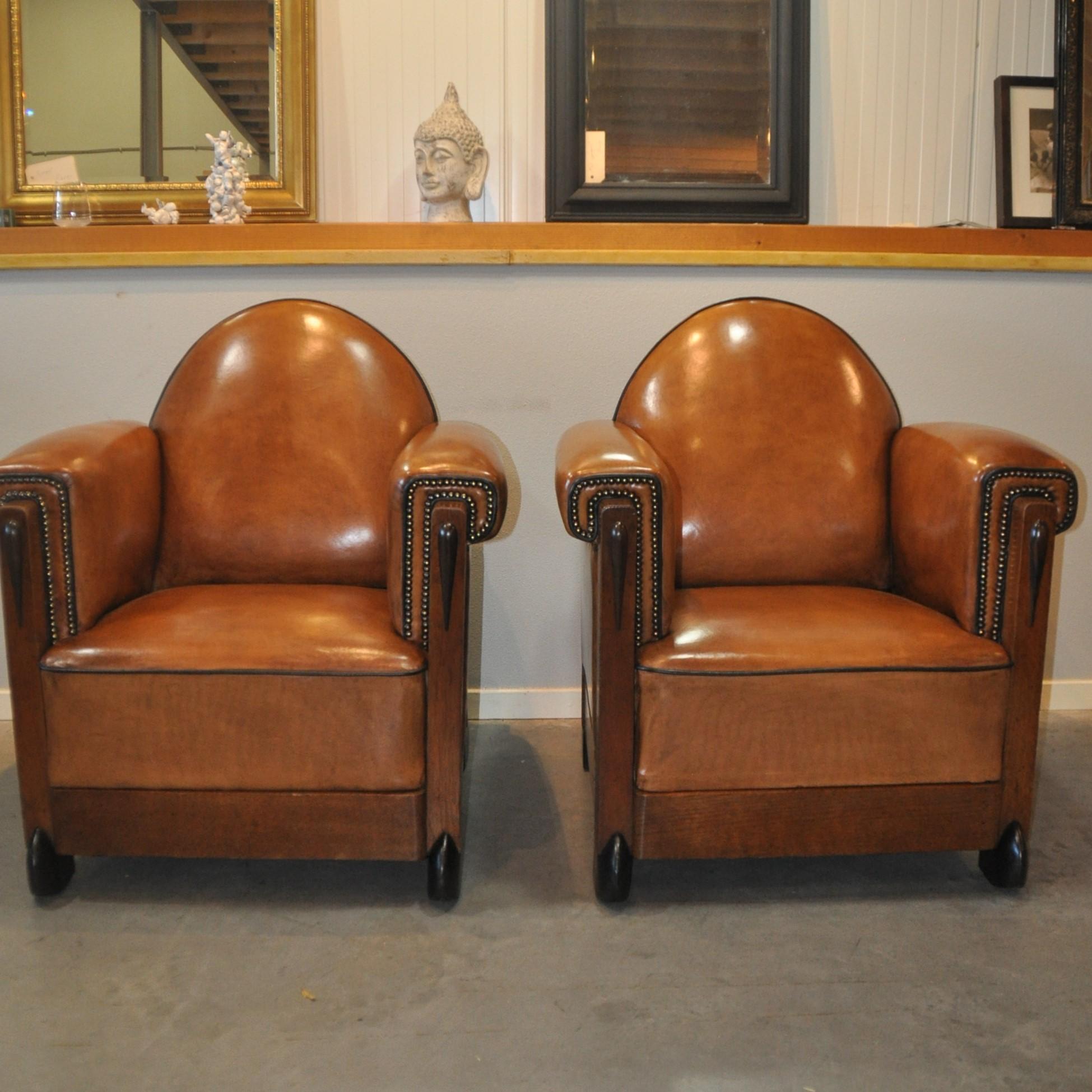 Amazing set of newly upholstered Art Deco sheep leather armchairs. These beautiful armchairs are in top (new) condition and upholstered with the best quality sheep leather. Equipped with fixed seats and finished with nails and black piping.

The