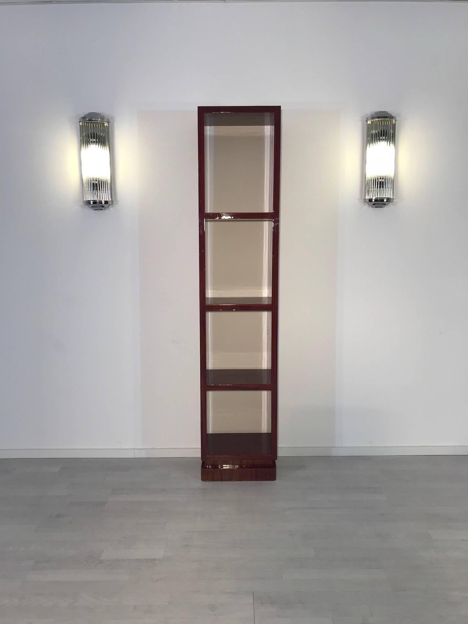 Elegant  shelf made out of amazing cherry wood. Convinces with its simple but luxurious design and the uniquely red grain.

 high gloss finished and handpolished surfaces
 storage space on four shelves with a total height of 190cm
 beautifully