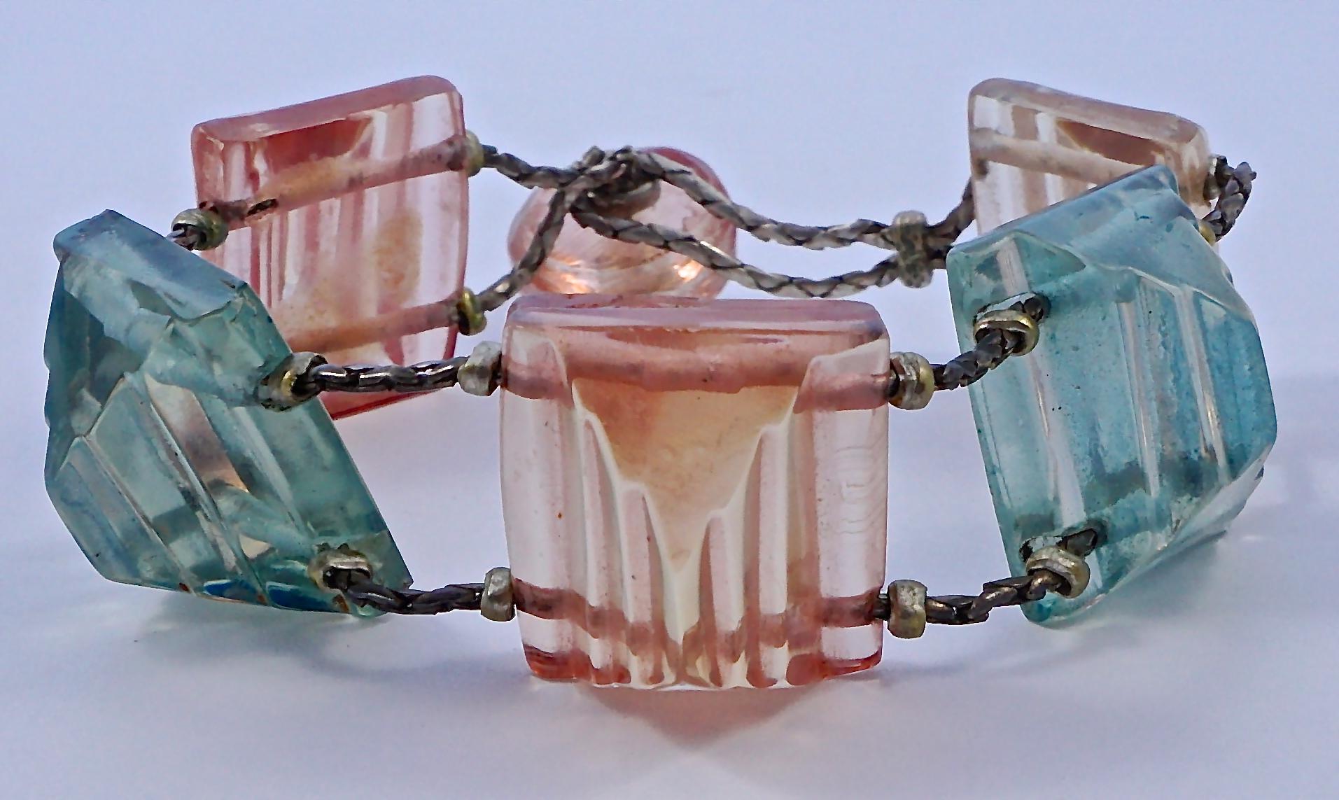 Art Deco bracelet featuring wonderful shell pink and mid blue early plastic beads, with a loop and bead fastening. The beads are threaded on to silver tone chain decorated with small metal beads. Measuring length 19cm / 7.48 inches not including the