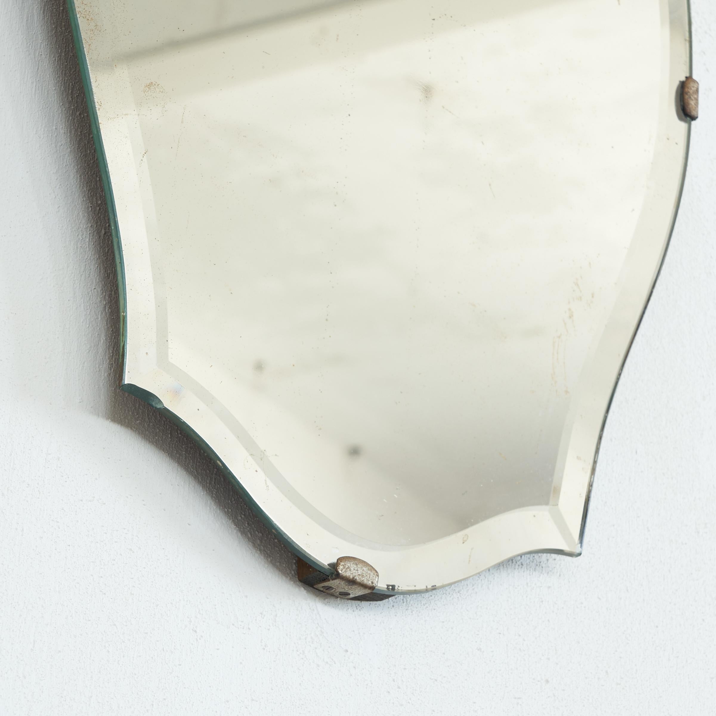 Unknown Art Deco Shield Mirror in Facetted and Patinated Mirror Glass, 1940s For Sale