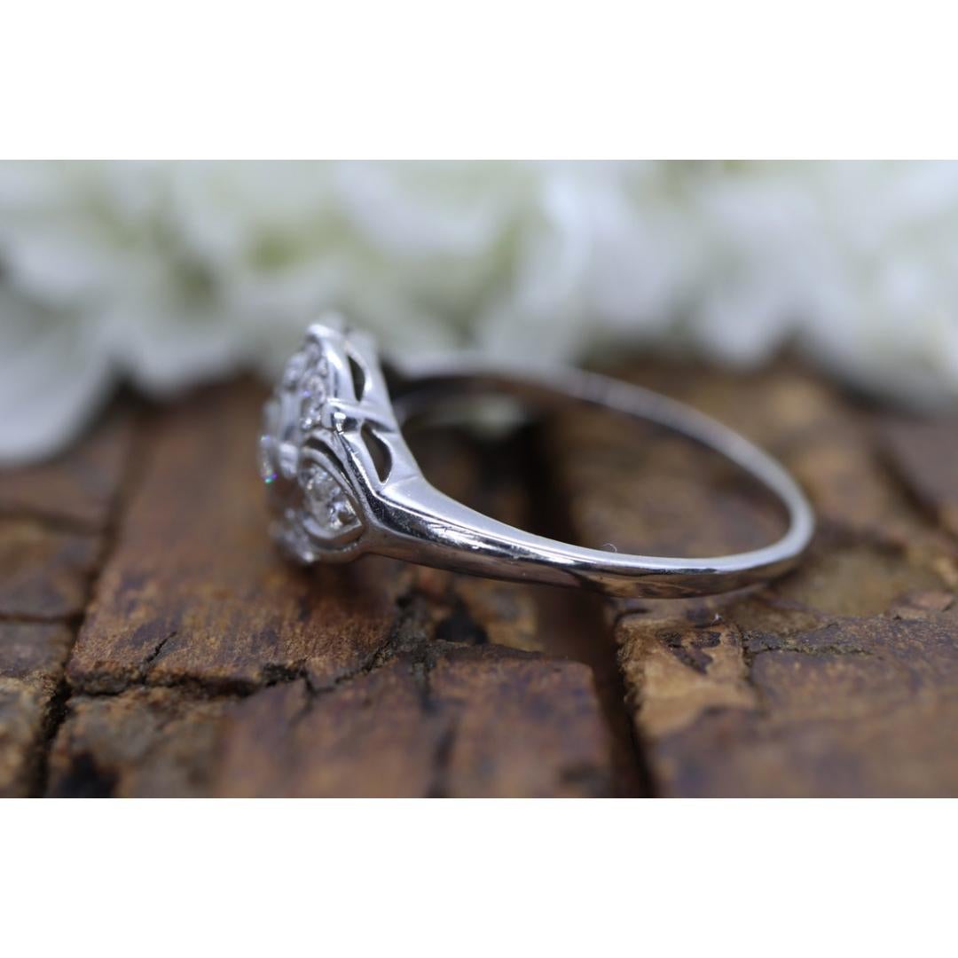 Art Deco Shield ring. 14k white gold with diamonds and filigree open design. For Sale 2