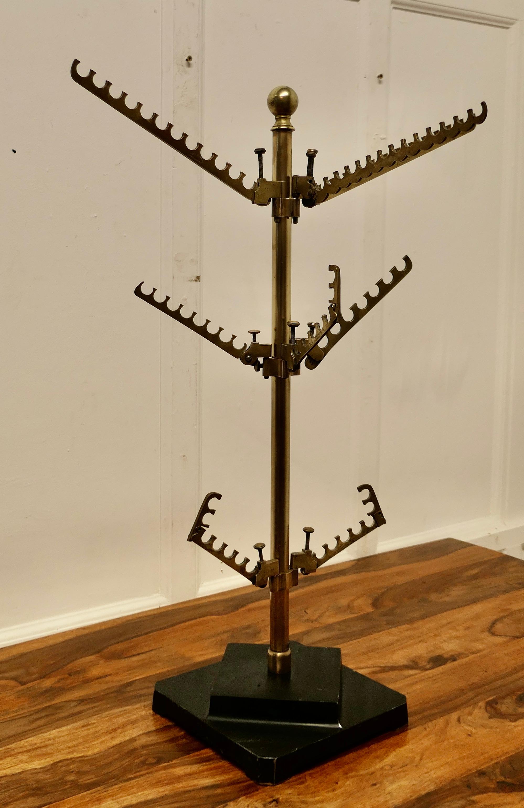 Art Deco Shop Window Display Stand

A lovely piece, and so rare, this one was made by F Sage & Co London for Potter & Sons, both names are etched into one of the brass branches
The stand is set on an odeon style heavy base, the upright column and
