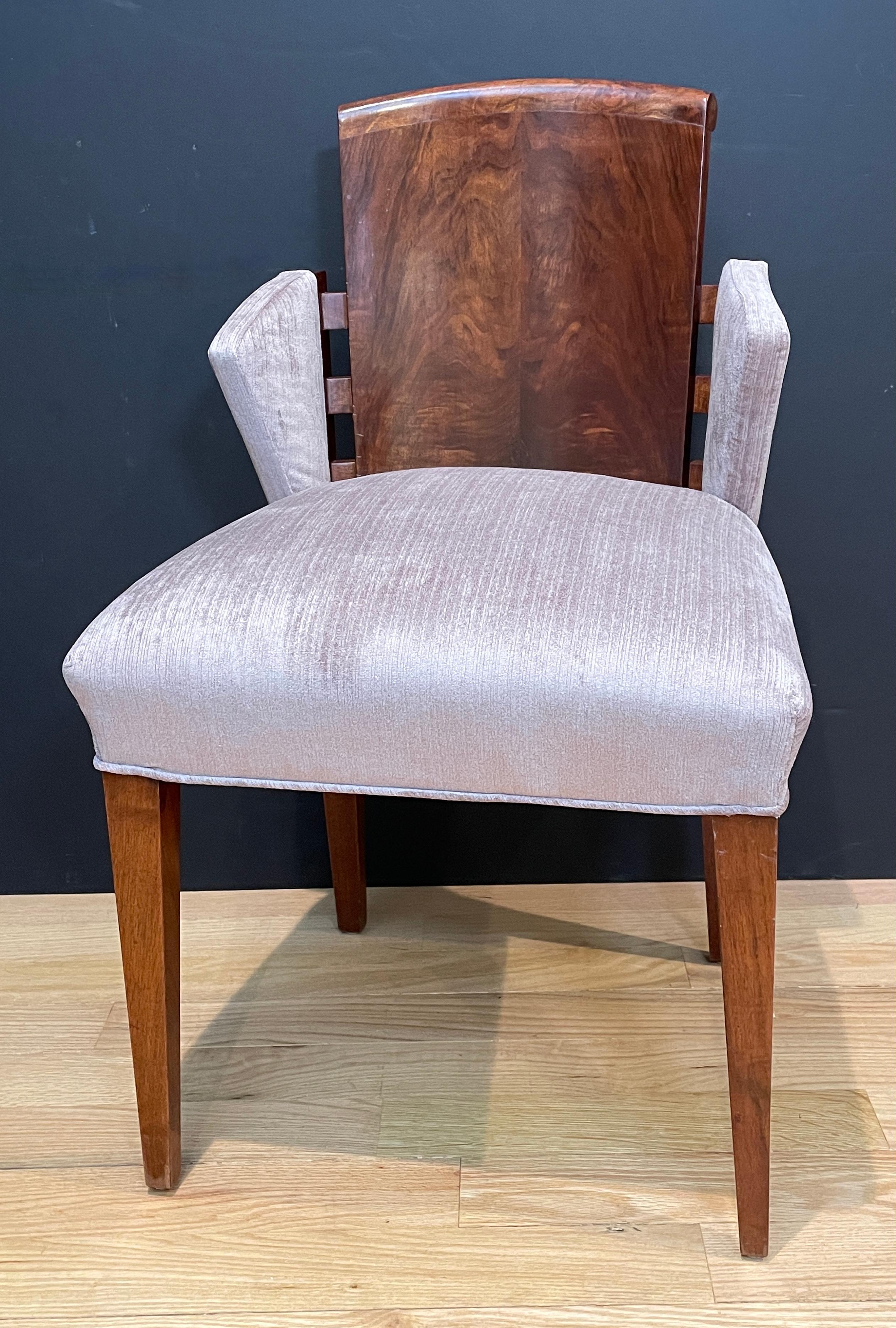 Art Deco side chair with small wingback arms. Book matched walnut veneer with light purple velvet upholstery. Beautifully stylized and usable as a side chair or desk chair.