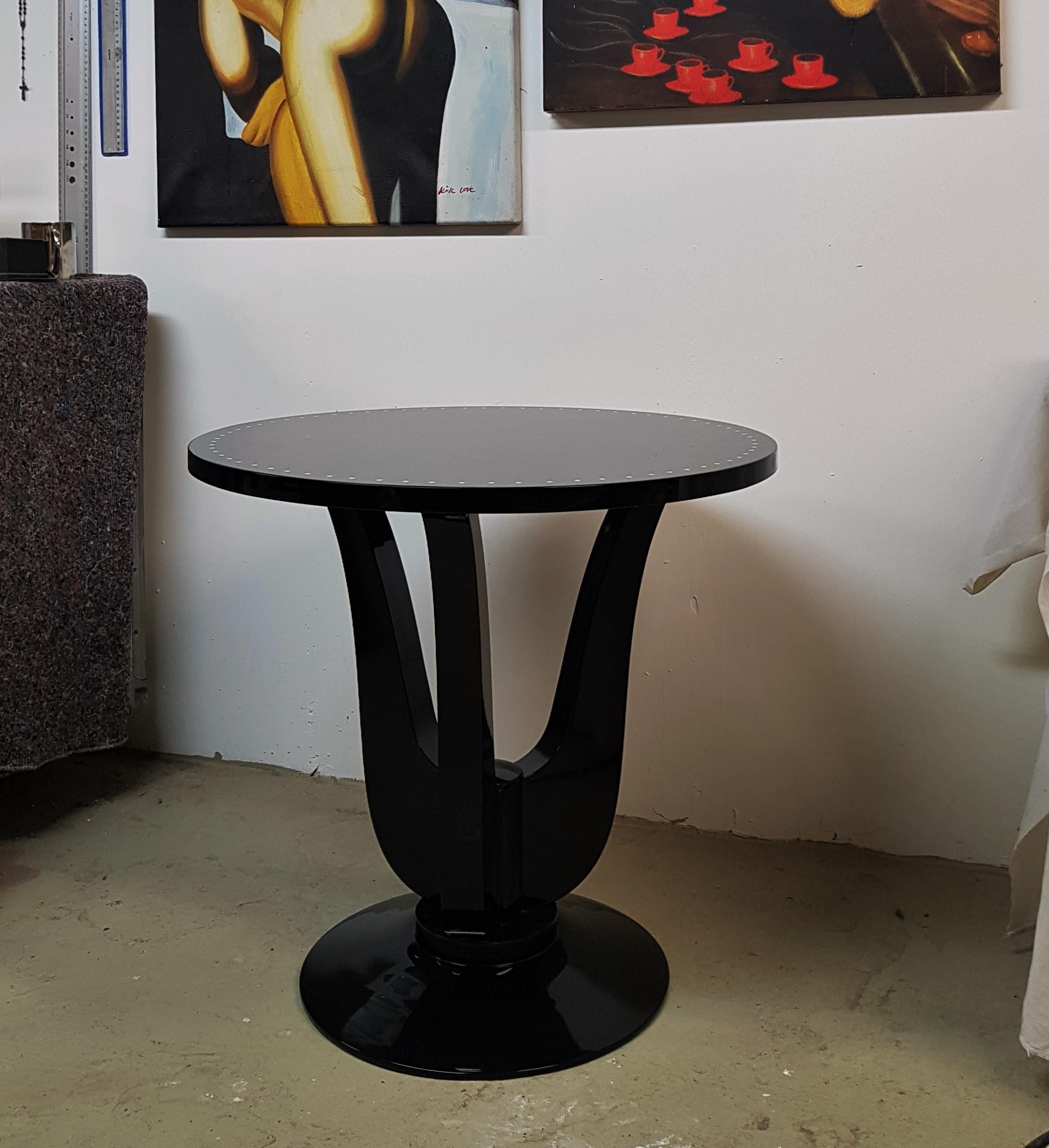 Art Deco side cocktail table. 
tabletop Macassar star shaped veneer. legs ebonized.
Ivory lacquer details. high gloss finish, hand polished.

other type of woods or colors on demand.

the two on the pictures are available right away.

  