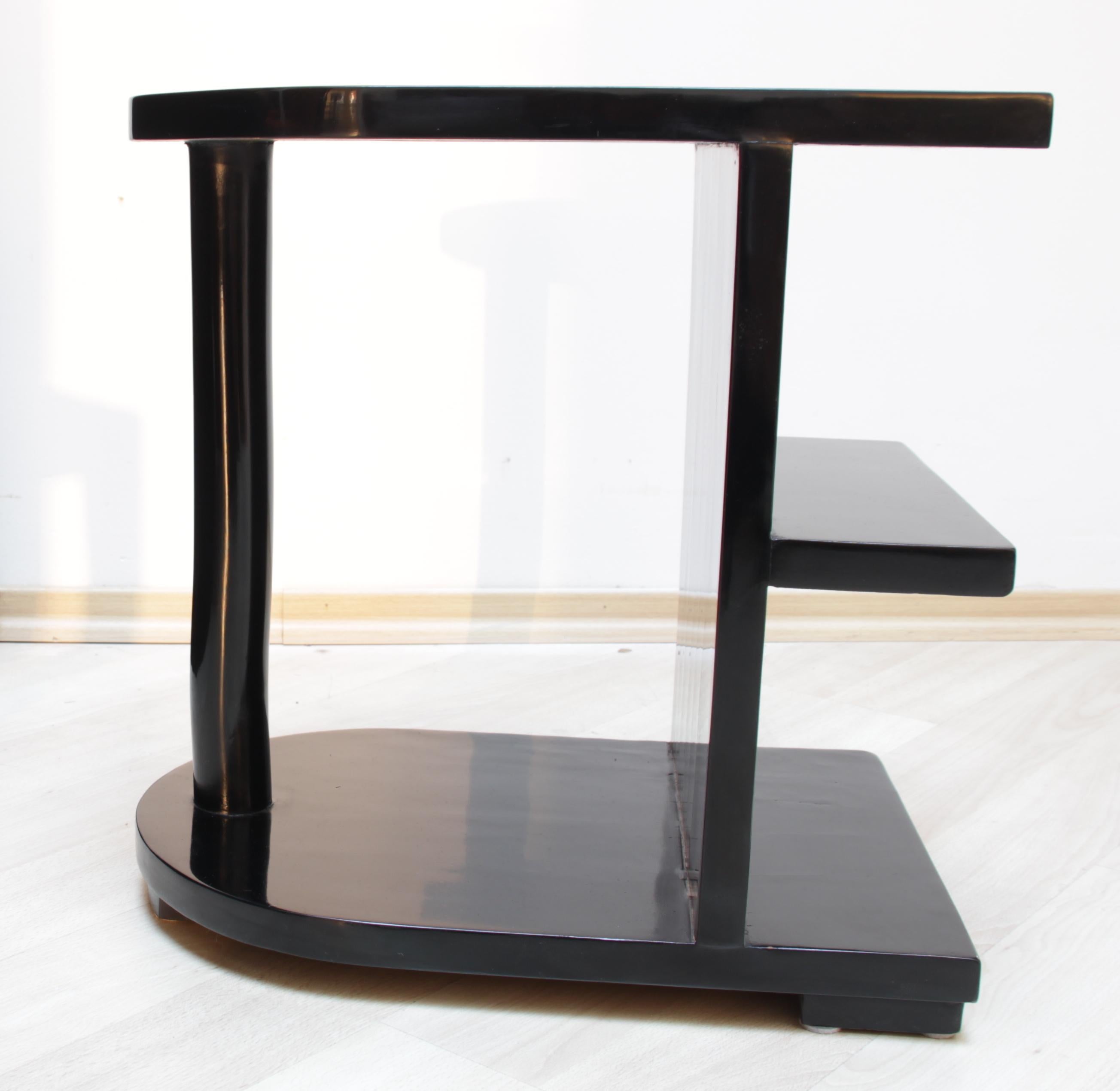Wonderful original Art Deco Side Table. 

Great modern design with three floors and one column. 

Ebonized walnut wood, hand rubbed with shellac.
