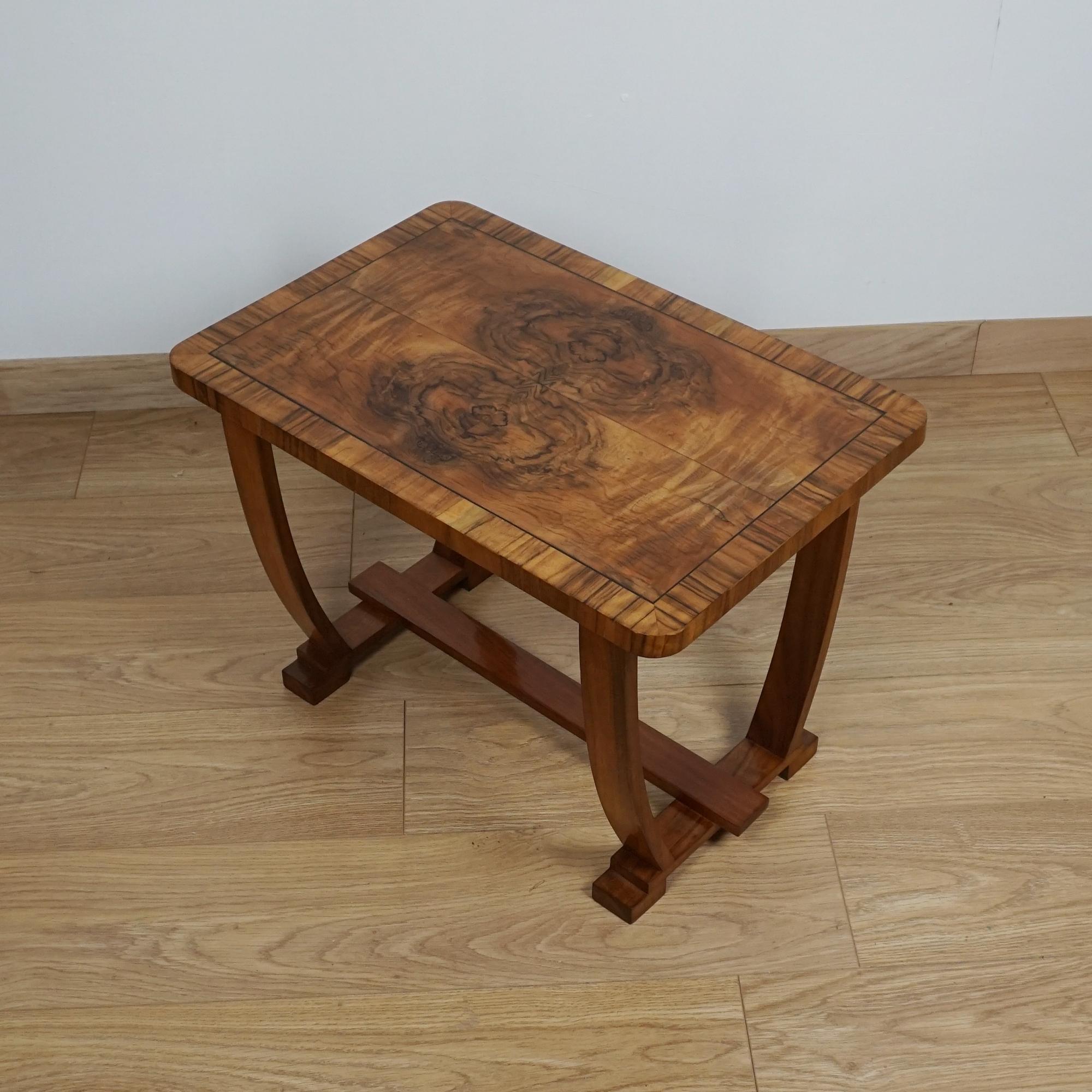 An Art Deco Burr walnut and figured walnut side table. 

Item Number: 0506255

All of our furniture is extensively polished and restored where necessary to the highest standards.