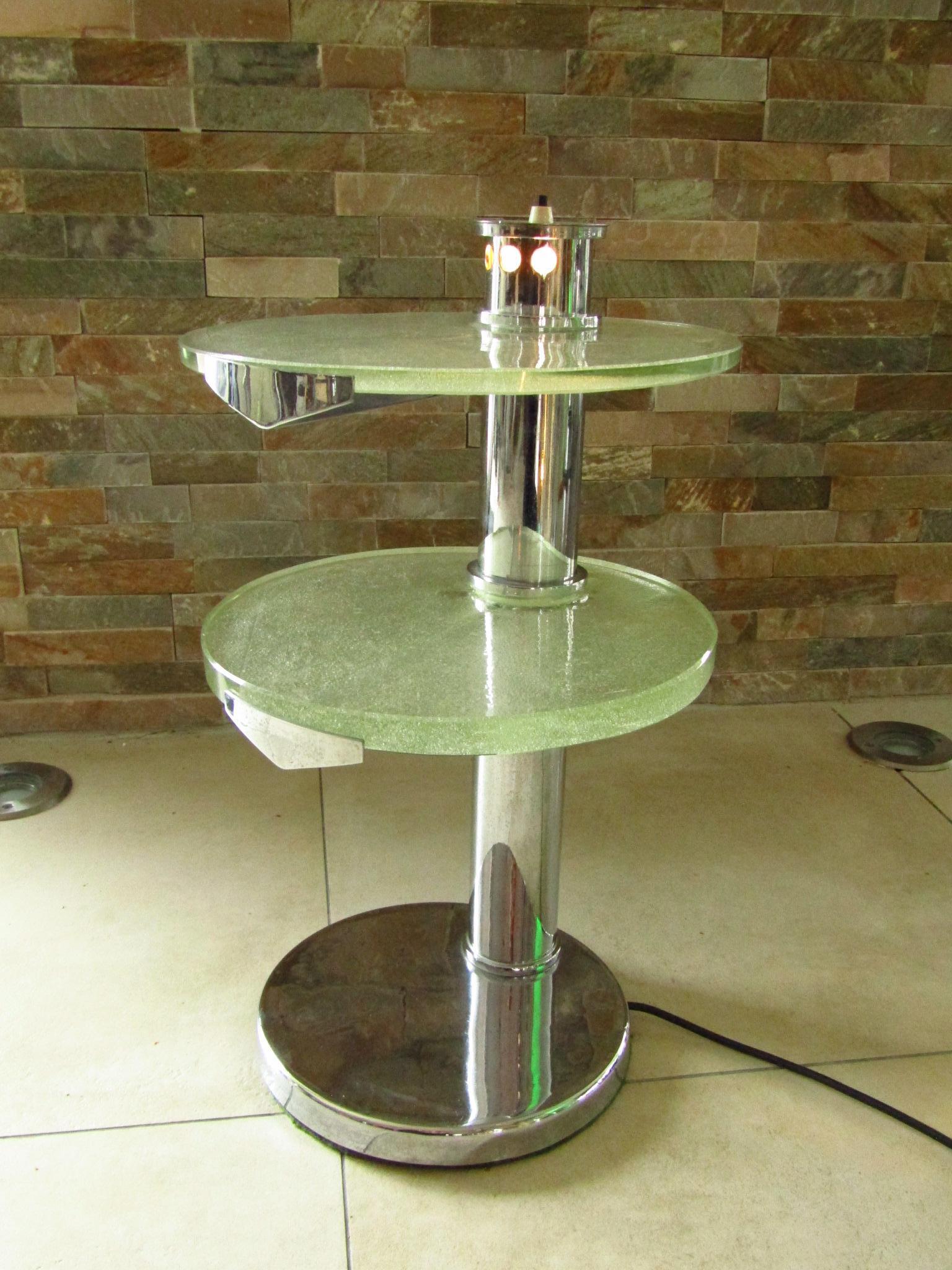 Original Art Deco illuminated side table by Maison Desny, Paris 1935. Original chromed base and original saint gobain frosted glass plates. Built in table lamp. good vintage condition. Some minor chips at the center of the glass plates, please see