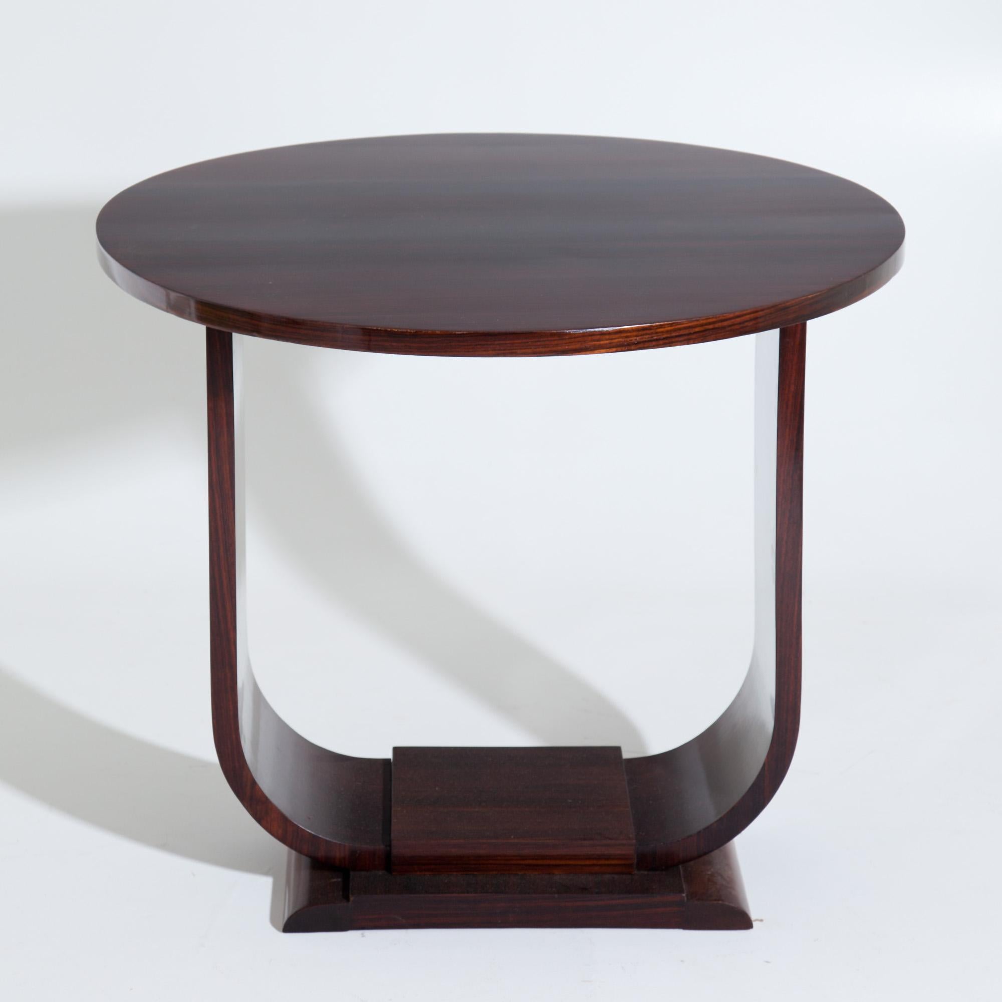 Art Deco table with round table top on U-shaped stand. Expertly prepared condition.