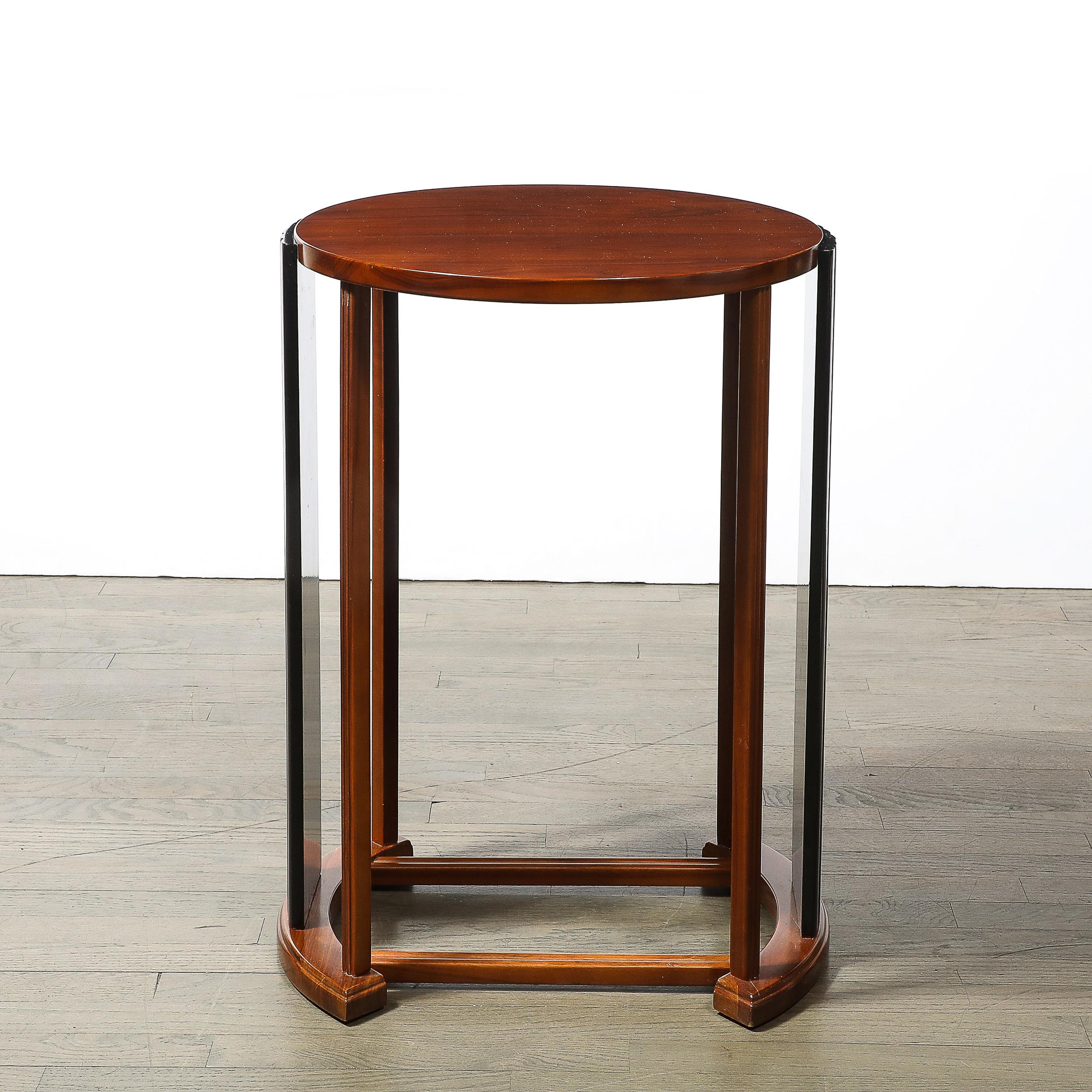 This beautiful Art Deco Side Table in Book-Matched Walnut & Black Lacquer Fluted Supports originates from the United States, Circa 1930. This piece beautifully combines the warmth of book-matched walnut with the sleek elegance of black lacquer