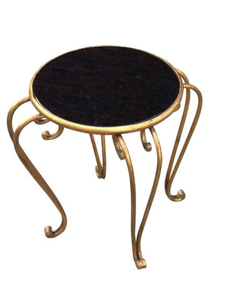 Art Deco side table in gild iron and black opaline, attributed to René Prou.