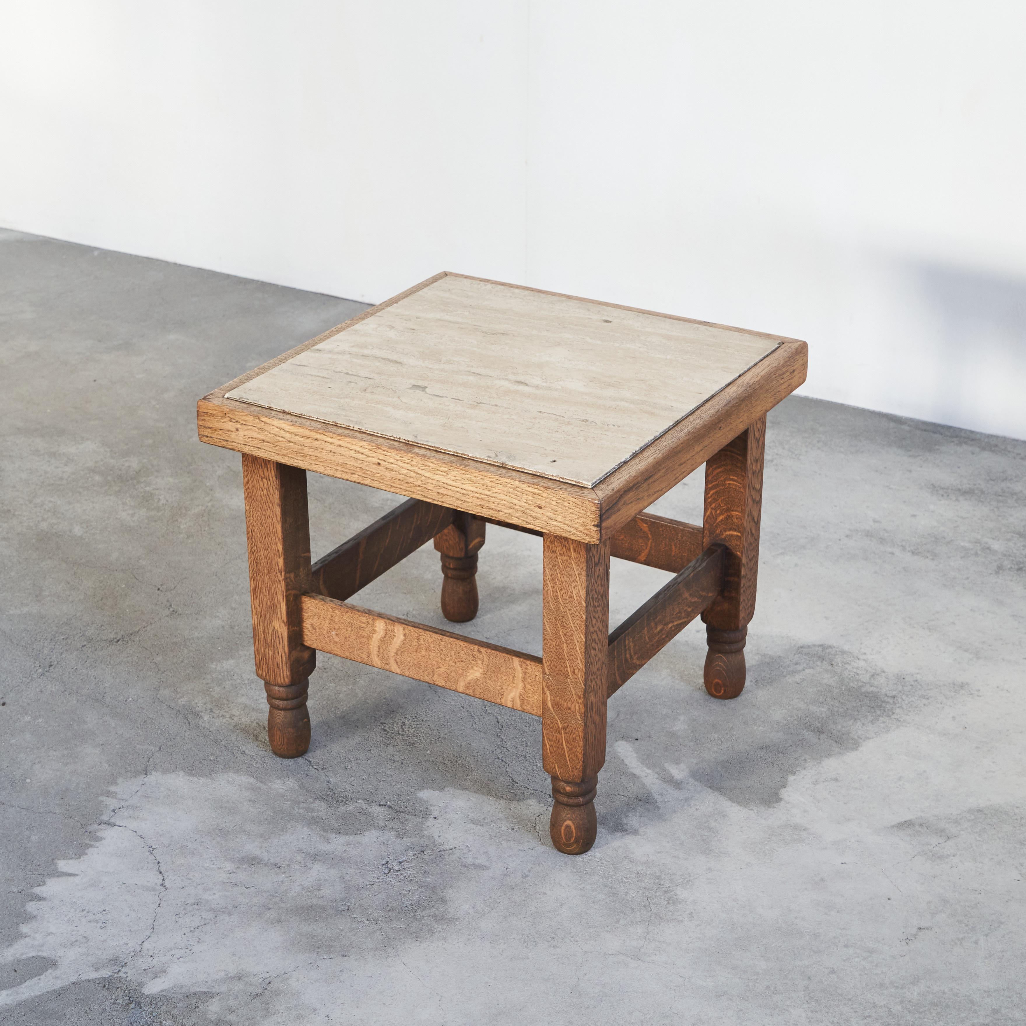 Art Deco Side Table in Solid Oak and Travertine 1930s.

This is a stunning side table in solid oak and beautiful travertine in a very subtle art deco style. Great use of materials and wonderful execution. A high end piece, which must have been